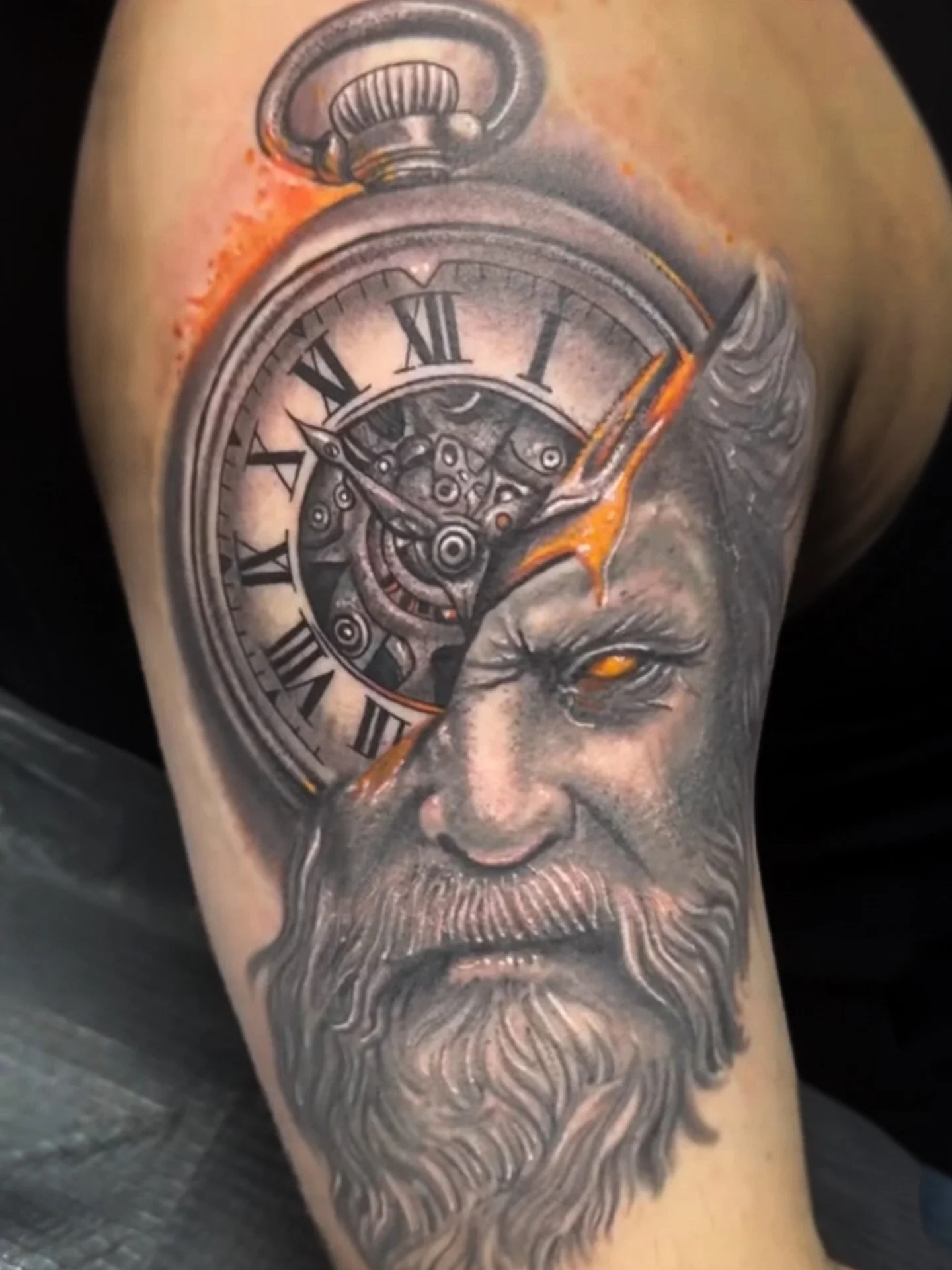 This black and grey realism piece, accented with subtle flames, symbolizes wisdom, the passage of time, and the battles etched into one&rsquo;s skin. Every shadow, every highlight, every detail was designed to tell a deeper story🕰️
.
.
Tattoo Artist
