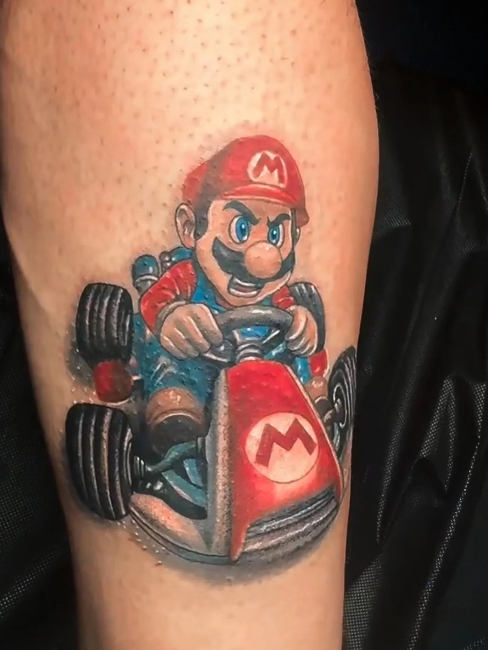 Our tattoo artist had an  incredible time bringing this Mario Kart inspired piece to life on Lex out in Houston location
.
.
Tattoo Artist: @navaink_ 
.
.
Location: @ambrosia_tattoos