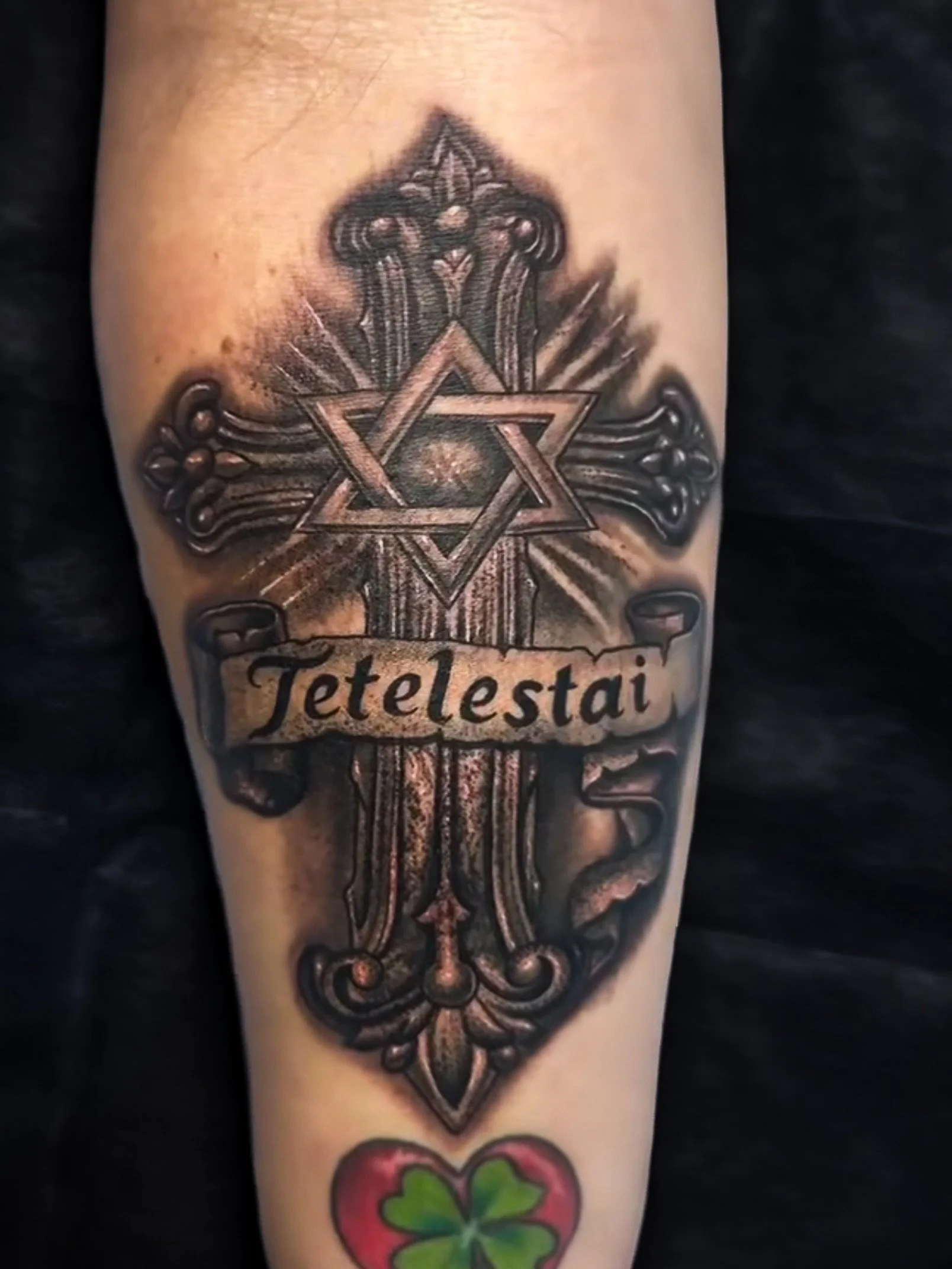 Session 1: Of a custom black &amp; grey memorial design featuring an ornate cross, Star of David, and a name banner brought together into one timeless tattoo
.
.
Tattoo Artist: @navaink_ 
.
.
Lagrange, GA