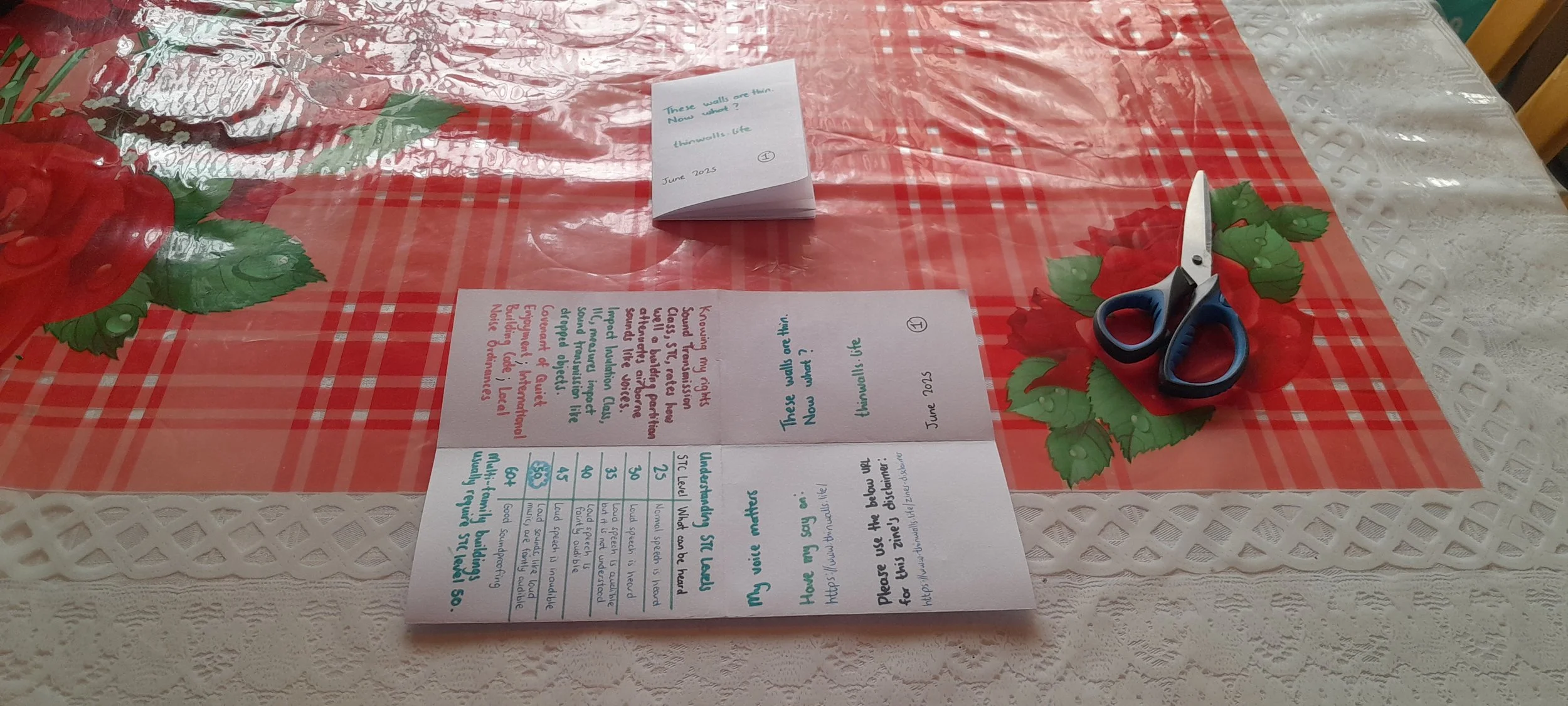 Folded paper showing multiple creases after completing all vertical and horizontal folds.