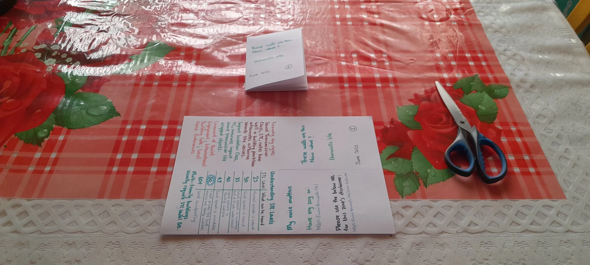 Zine page folded in half width-wise along the short edge, forming a small rectangle.