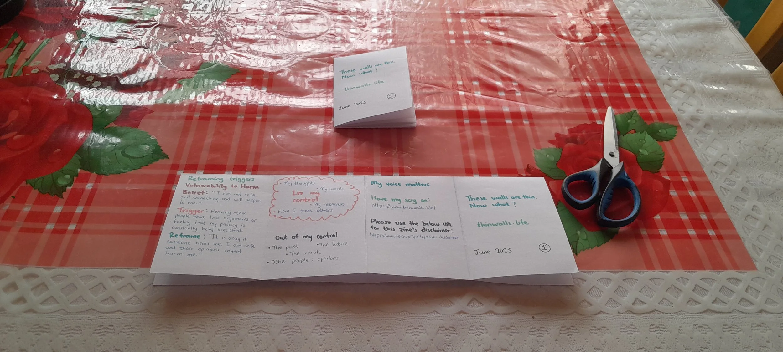 Paper folded lengthwise along the long edge, creating a slim horizontal rectangle.