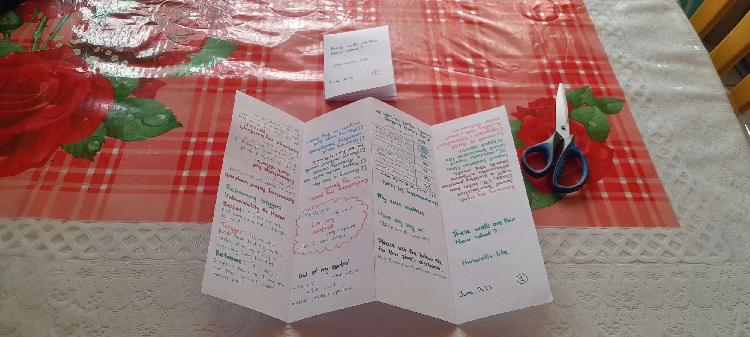 Partially unfolded paper opened into a zig-zag accordion shape with visible panels.