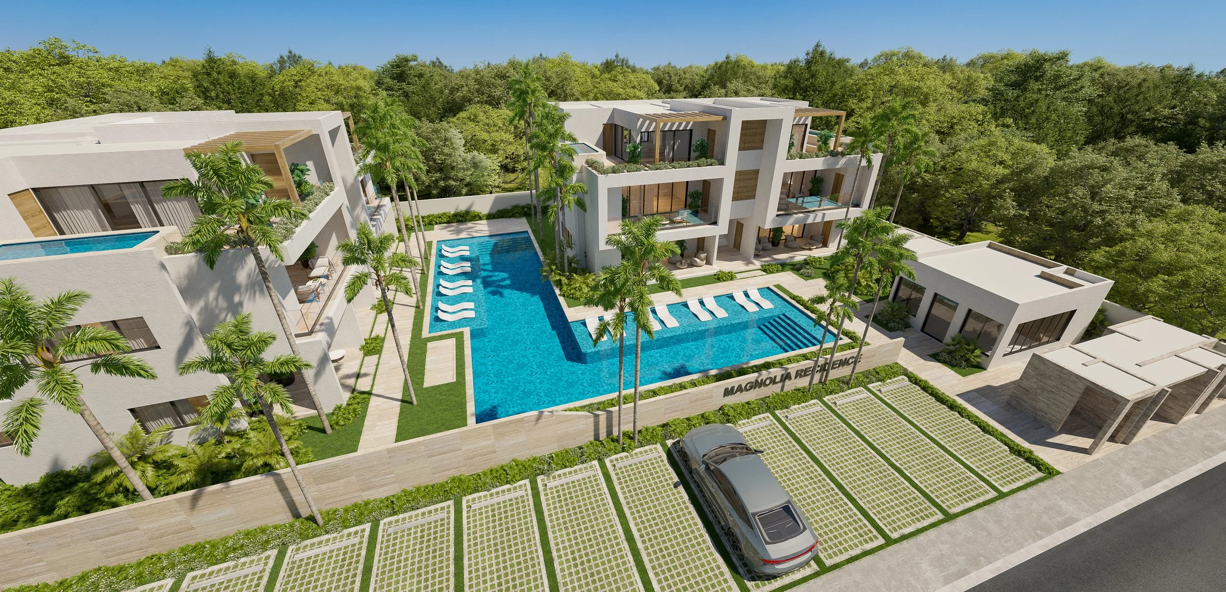 Rendering of Magnolia Residence, a modern residential complex with multiple buildings surrounding a large swimming pool. The pool area includes several lounge chairs and palm trees, with parking spaces and a car in front.