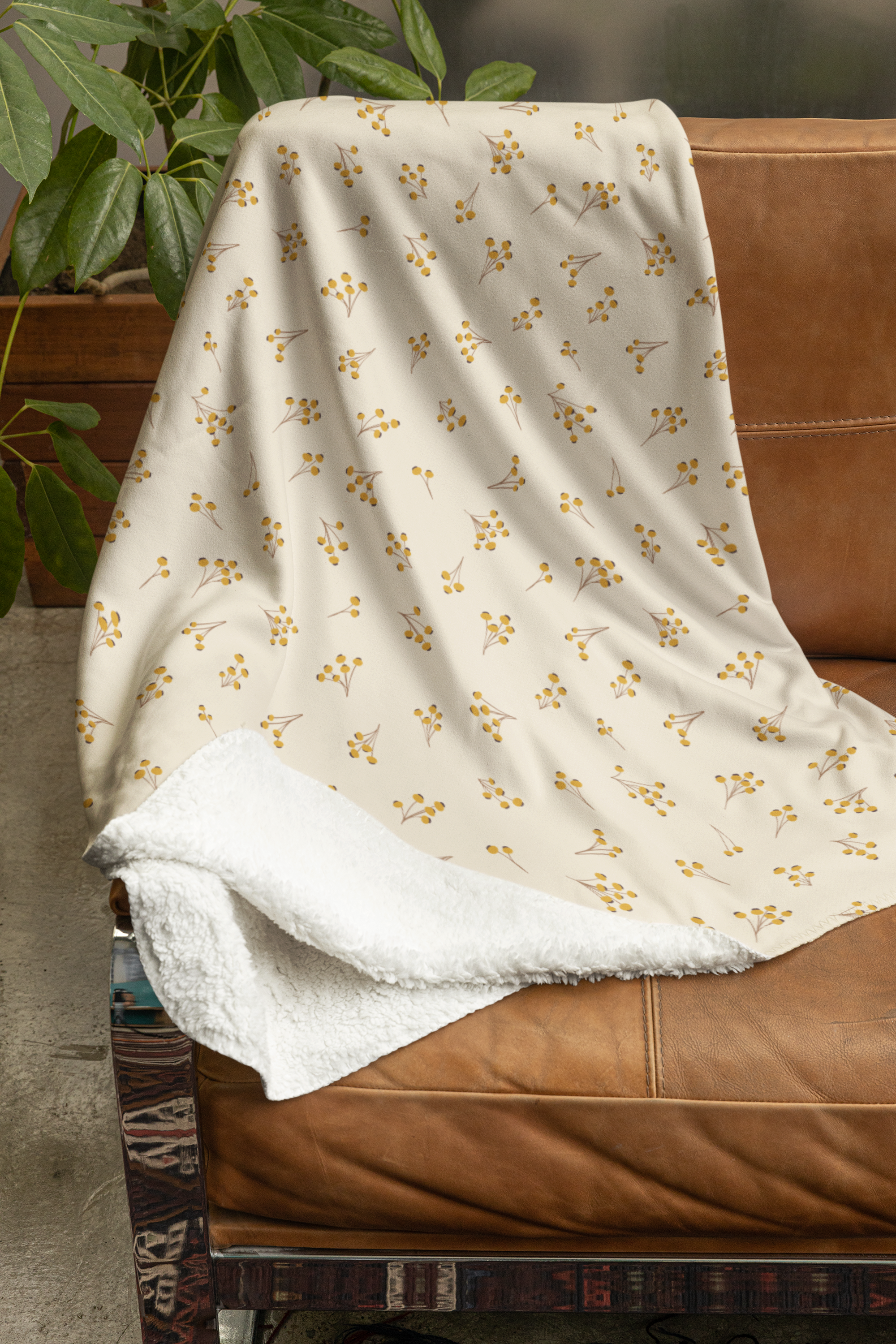 mockup-of-a-sherpa-fleece-blanket-placed-on-a-couch-m35706.png