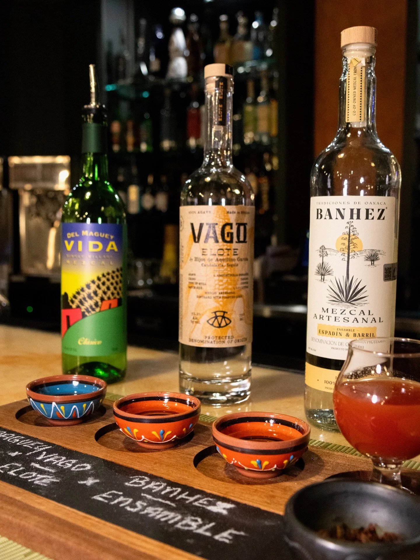 Now serving Tequila + Mezcal Flights! Enjoy a curated selection of three different tequila or mezcals served with a traditional side of chapulines. 🦗
