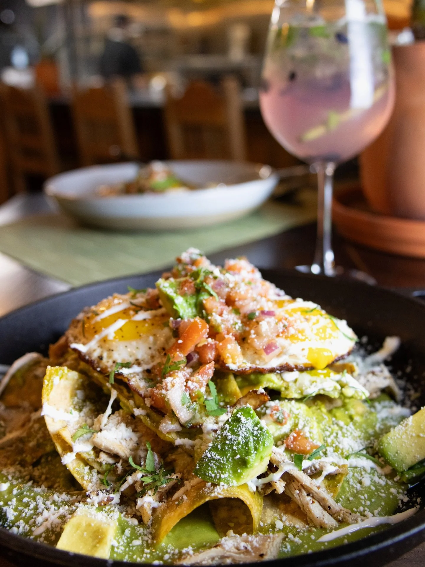 Meet your newest weekend obsession. 🍳

Chilaquiles Con Huevo - baked corn tortilla chips tossed in salsa verde with shredded chicken, cheese, and Mexican creama, topped with 2 perfectly sunny side up eggs, avocado, and pico de gallo. 

Desayuno at X