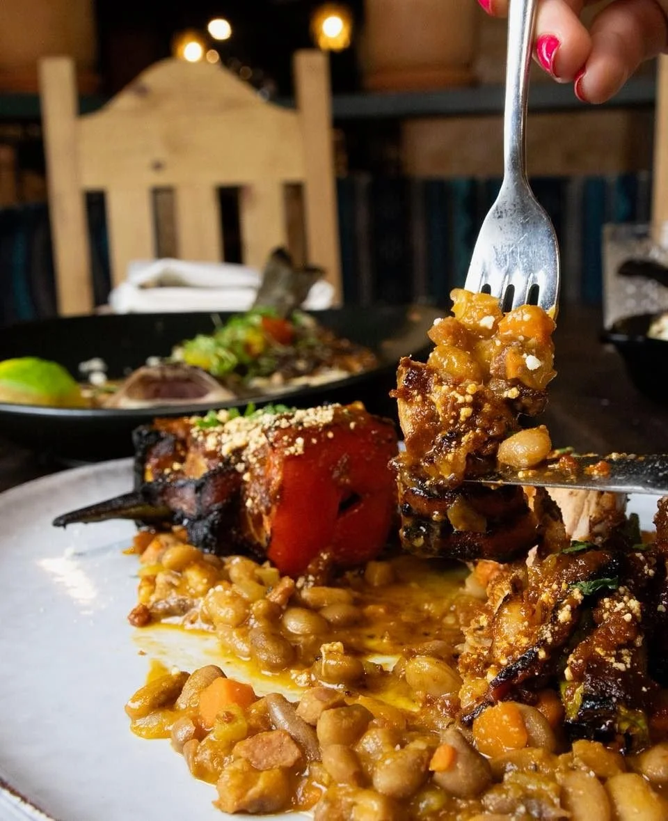 Alambre de Cerdo: Charcoal grilled bacon wrapped heritage pork tenderloin "shish kabob al pastor" skewered with fresh pineapple and spring onions served with frijoles borrachos. 

Your weekend flavor is served! 🍍