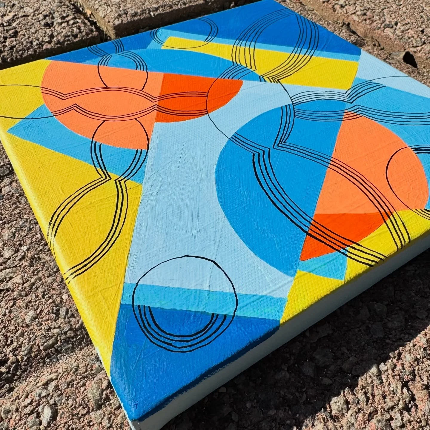 I painted over a canvas to mess around with colors and line. I think I started my new series. I love how the colors stand out with the black line. I intentionally didn&rsquo;t sand down the original paint because I wanted more texture. 

When I creat