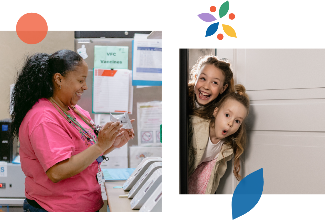 A nurse in pink scrubs holding a medical injection in a hospital setting, with two children peeking from behind a cabinet, looking playful and surprised.