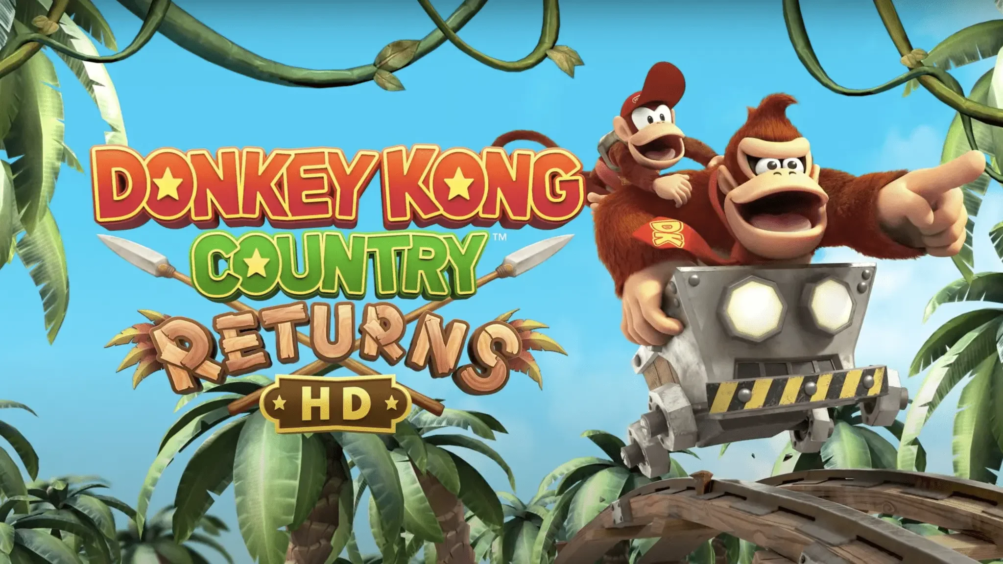 Imagen del videojuego Donkey Kong Country Returns, con Donkey Kong y Diddy Kong en un escenario de jungla con árboles y línea de vías del tren.