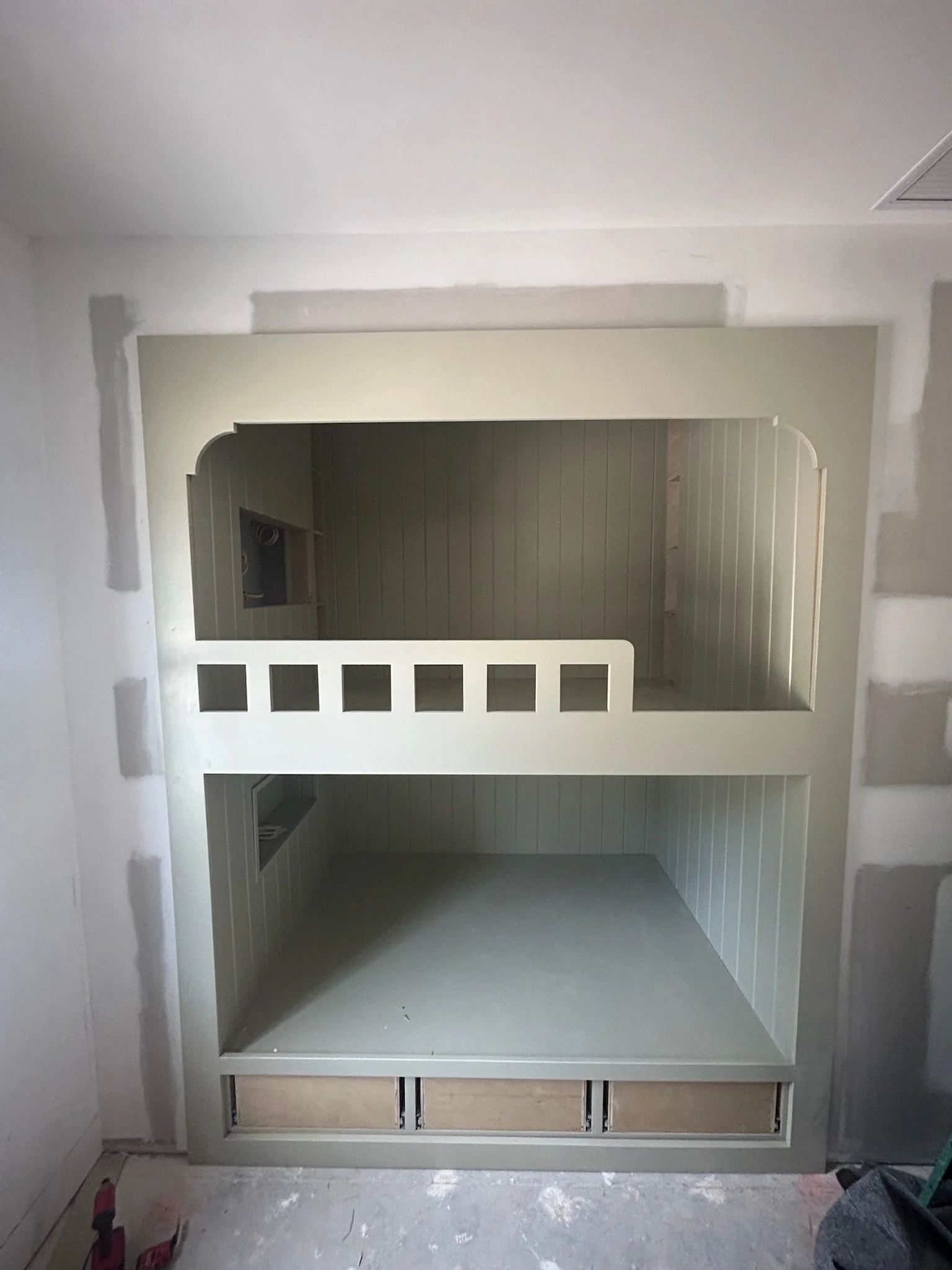 Custom built in wood bunk beds furniture in a bedroom
