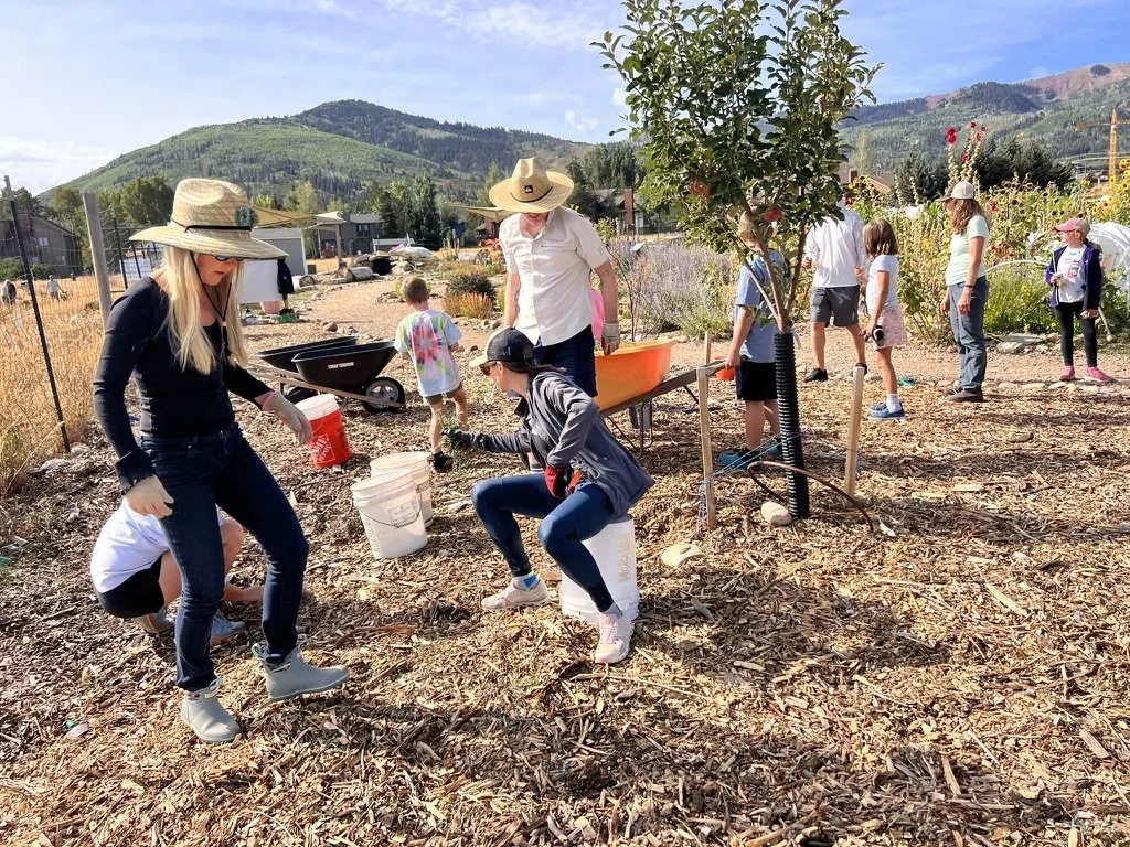 Summit Community Gardens Weeding and Mulching.jpeg