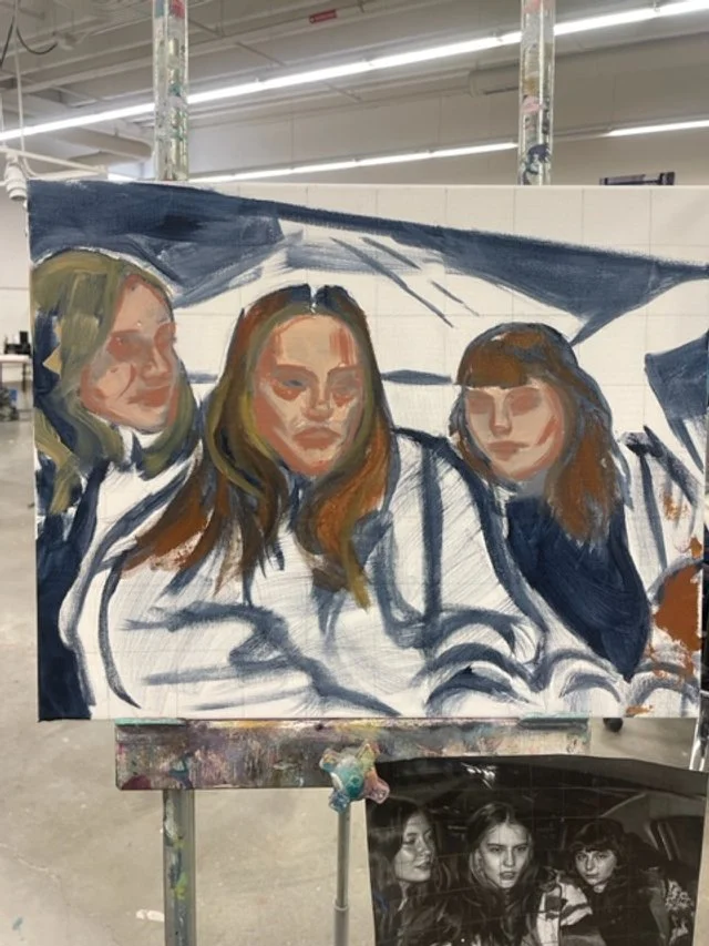 An unfinished painting is shown of three female figures