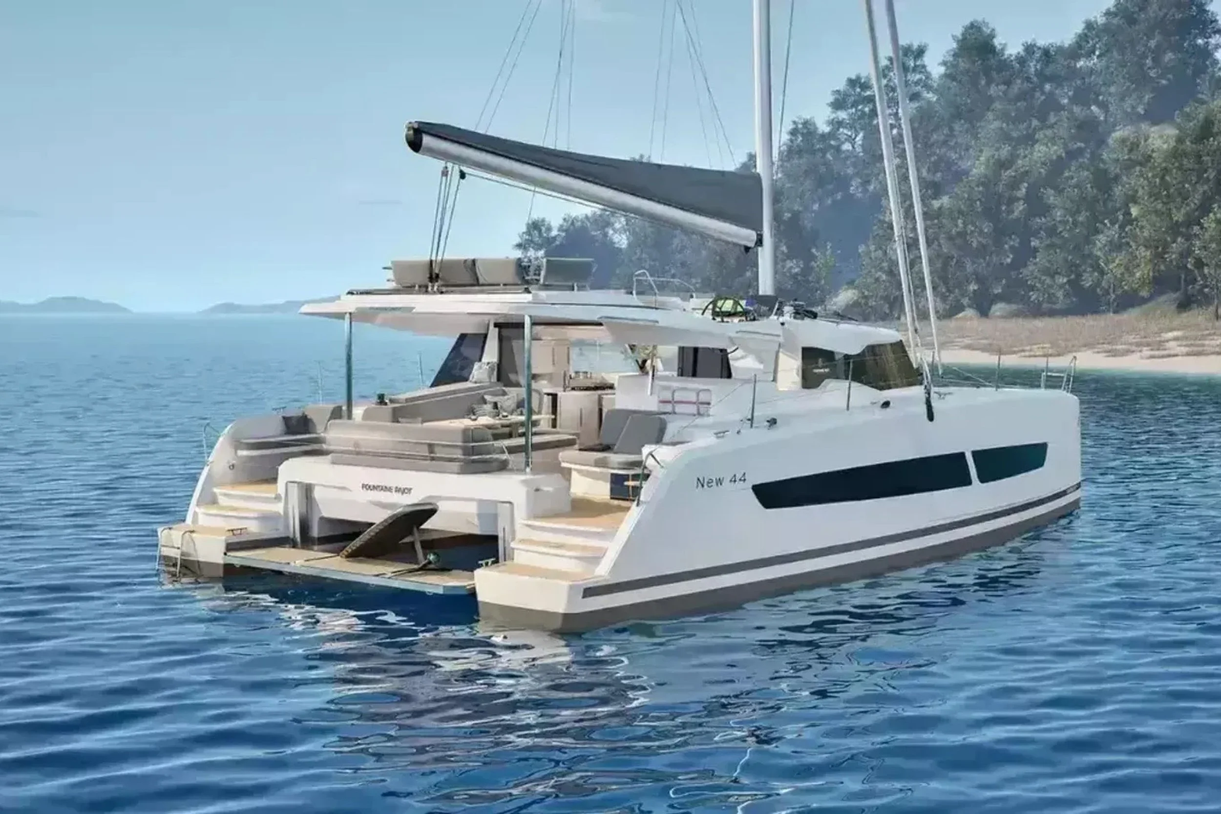 Luxury white sailboat with multiple decks floating on calm blue water near a shoreline with trees.