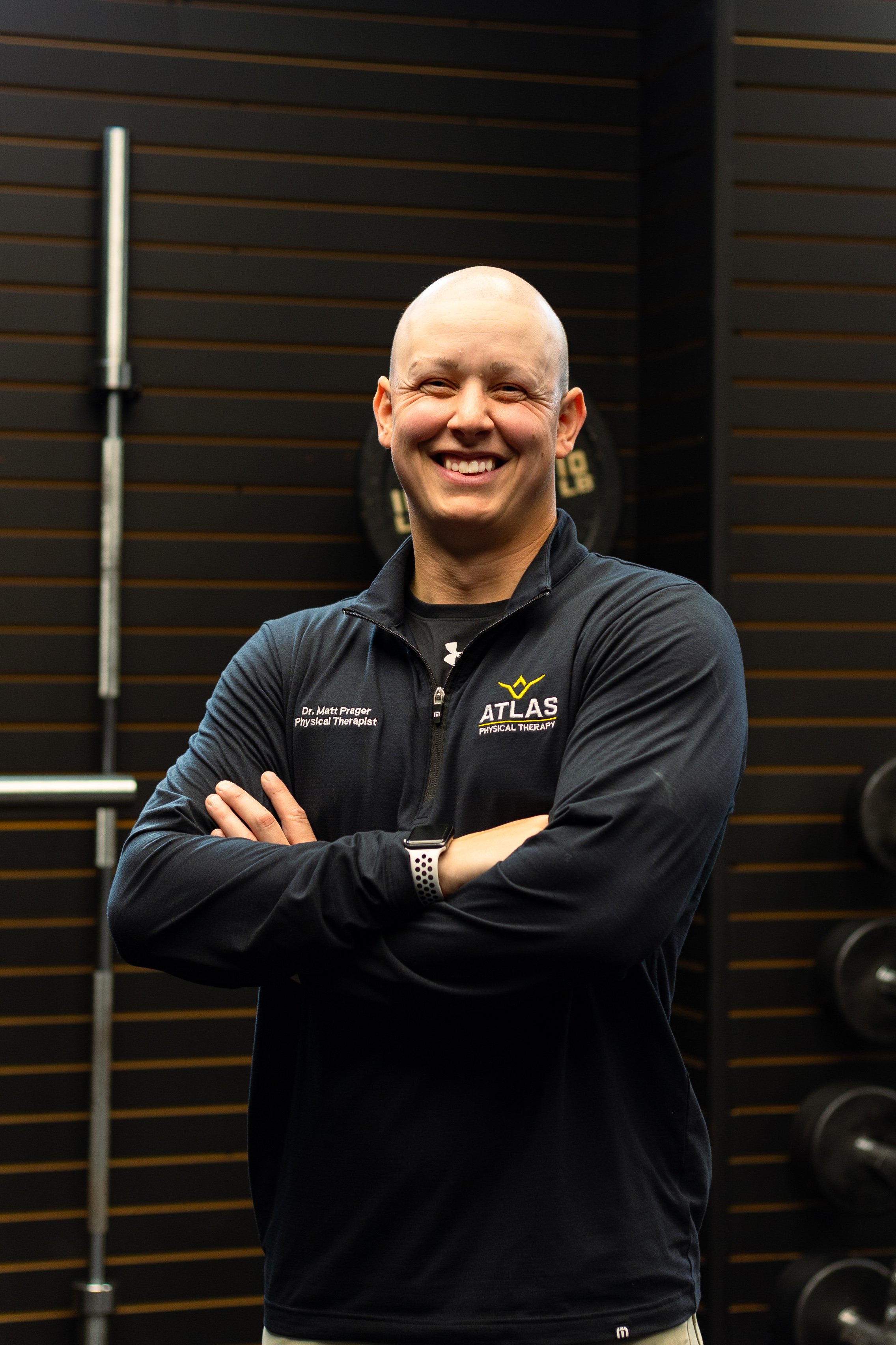 Physical Therapist working in athletic gym in Huntington
