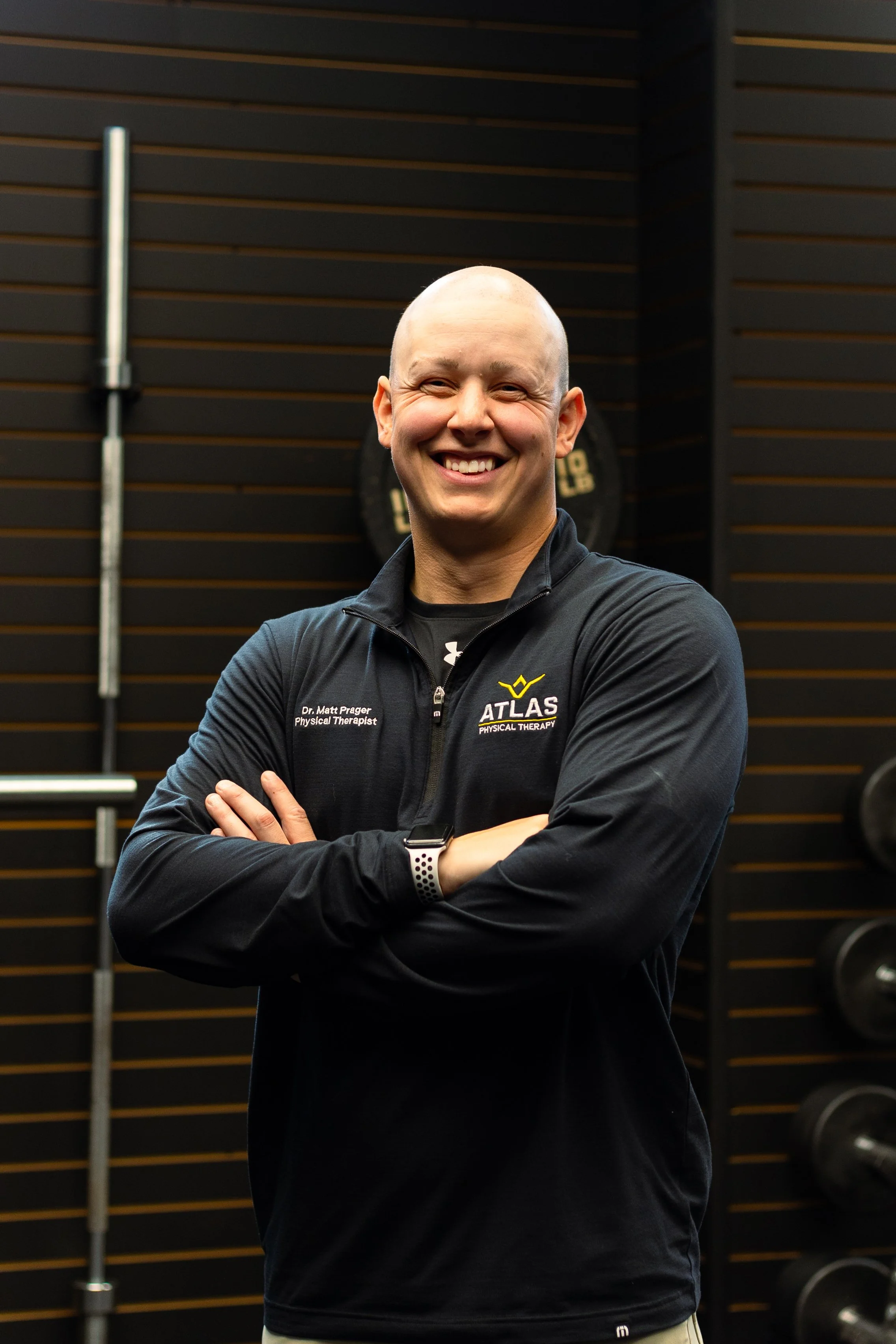 Physical Therapist working in athletic gym in Huntington