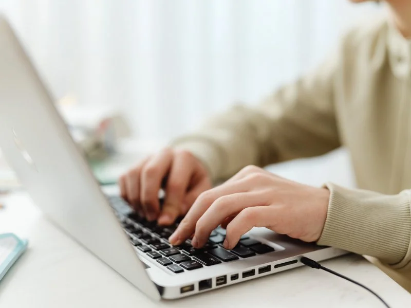 Business owner using outdated computer which leads to cyber security risk