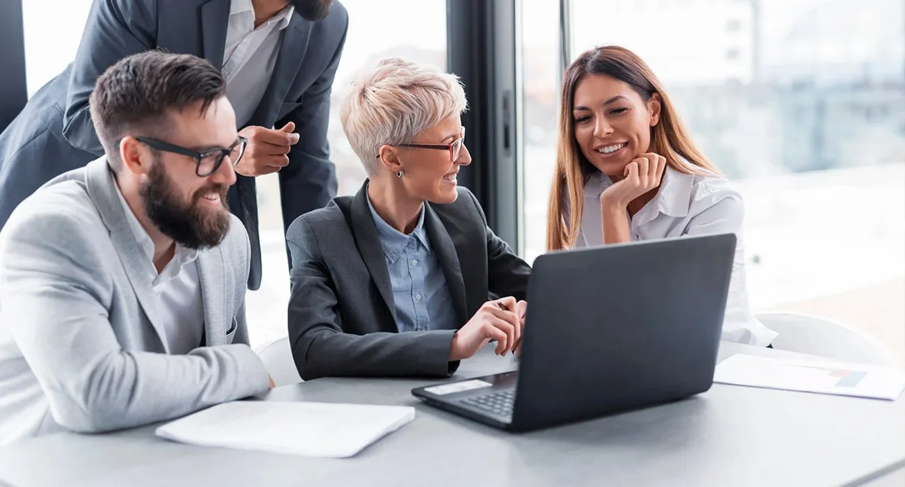 Support team staff member answering client calls for a trusted managed IT service provider.