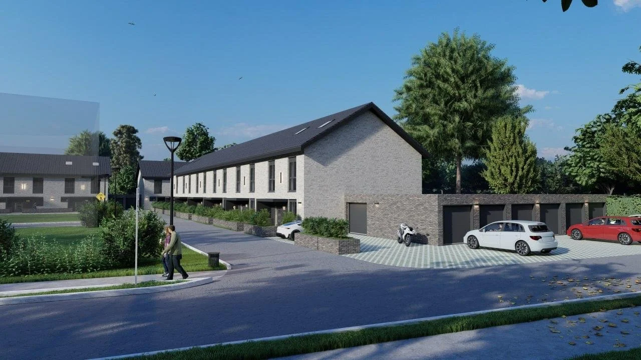 Rendering of a modern residential neighborhood with multi-story townhouses, parked cars, trees, and a person walking on the sidewalk during daytime.