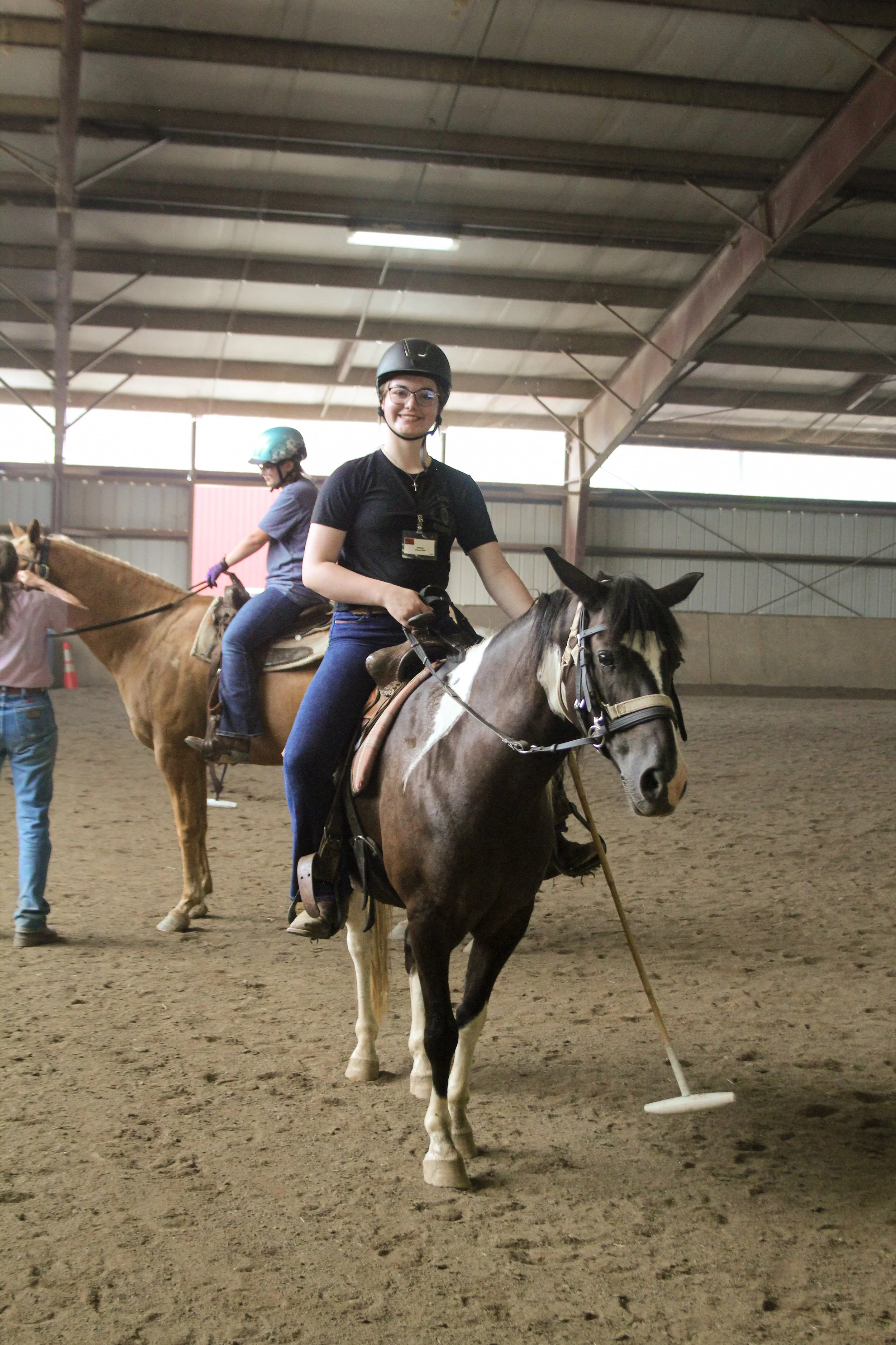 Girl playing polo