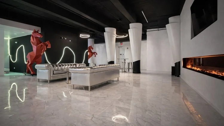 B-side lounge with fireplace at Vanilla Skies
