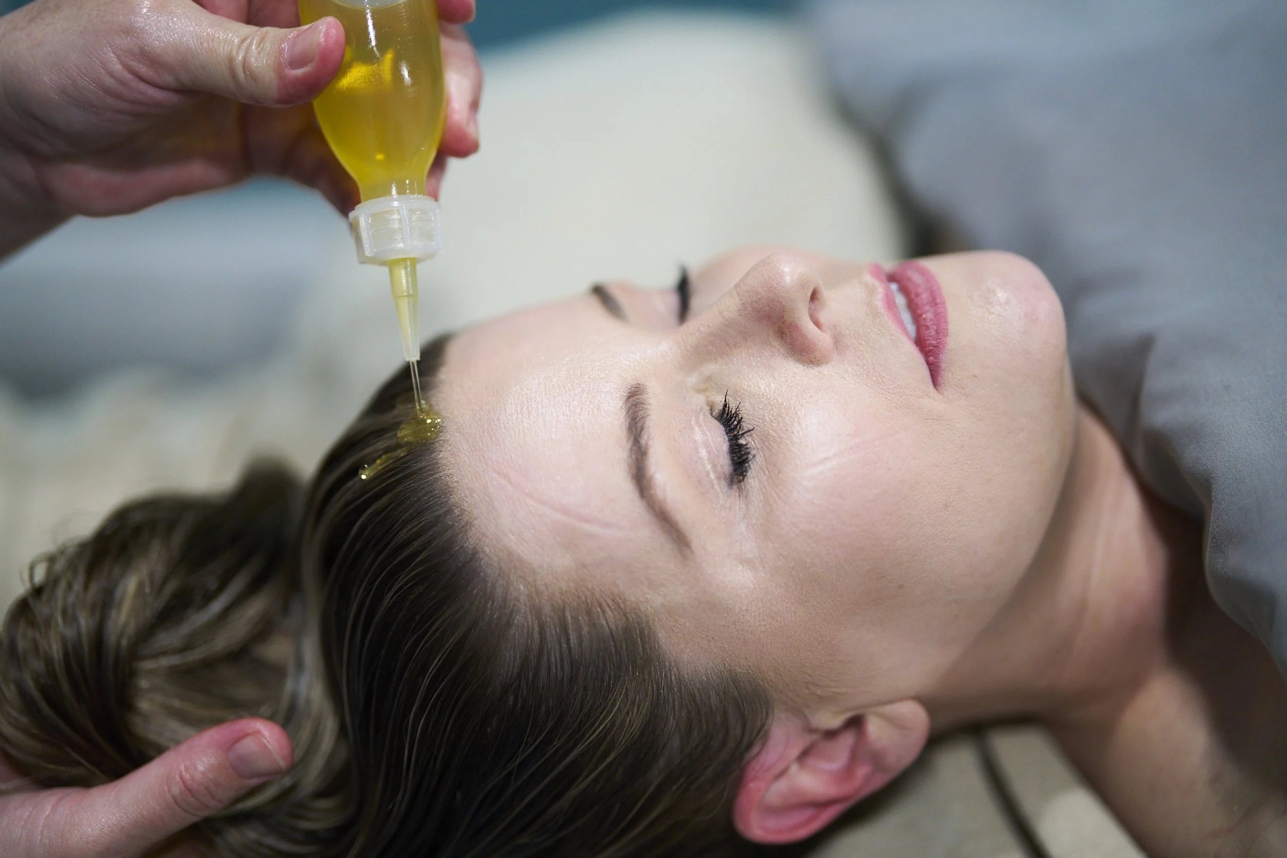 Enjoy a luxurious enhancement with our hot oil scalp treatment 