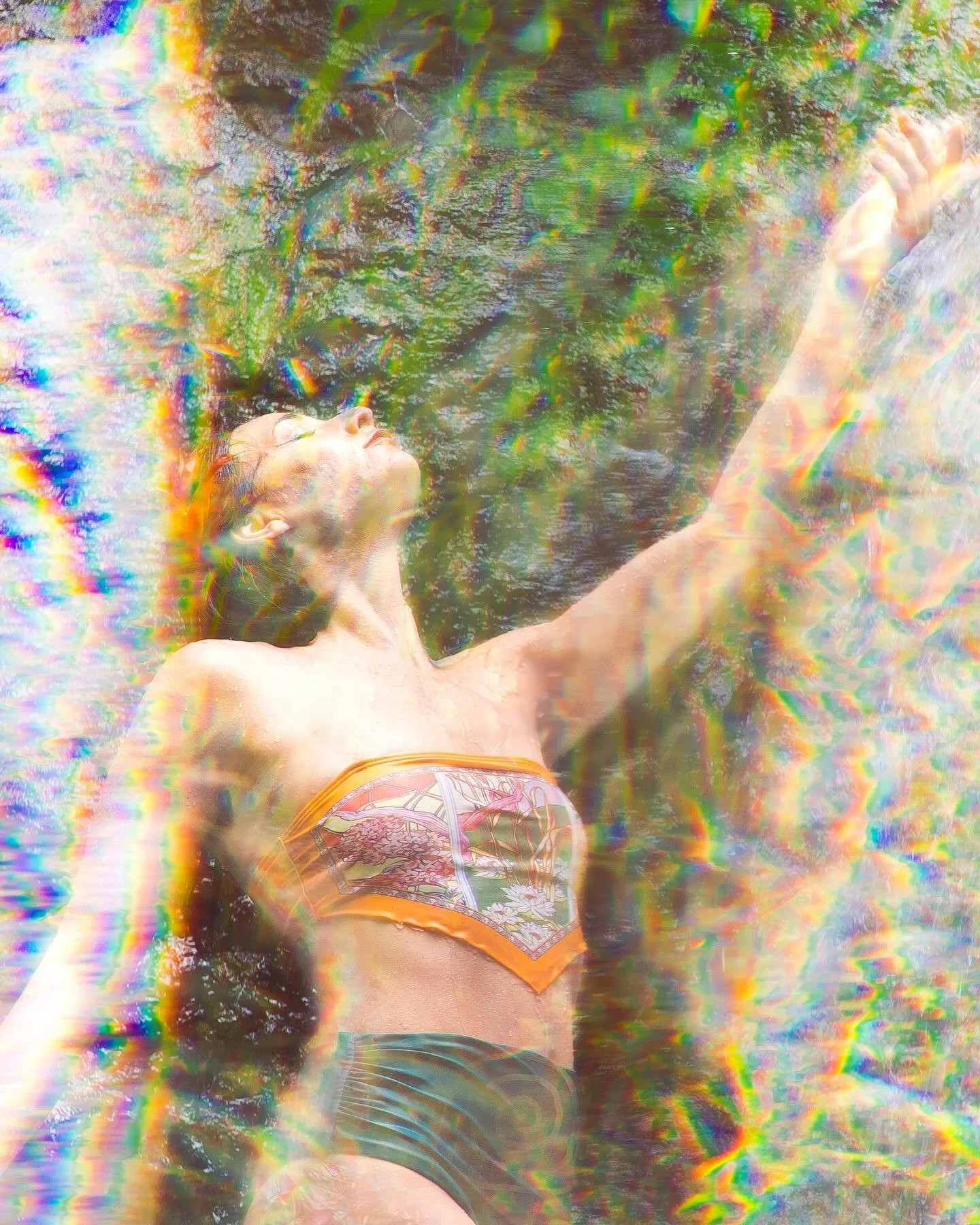 (Part 2): Waterfall invocation series: reclaiming the divine feminine. 

This self-portrait captures a moment of embodied reverence beneath a wild waterfall. 

My body, partially merged with the water through double exposure, evokes spiritual union w