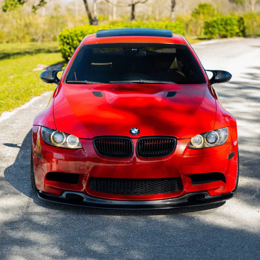 Red BMW E92 M3 carbon fiber lip install at PDXEuroWerks Portland
