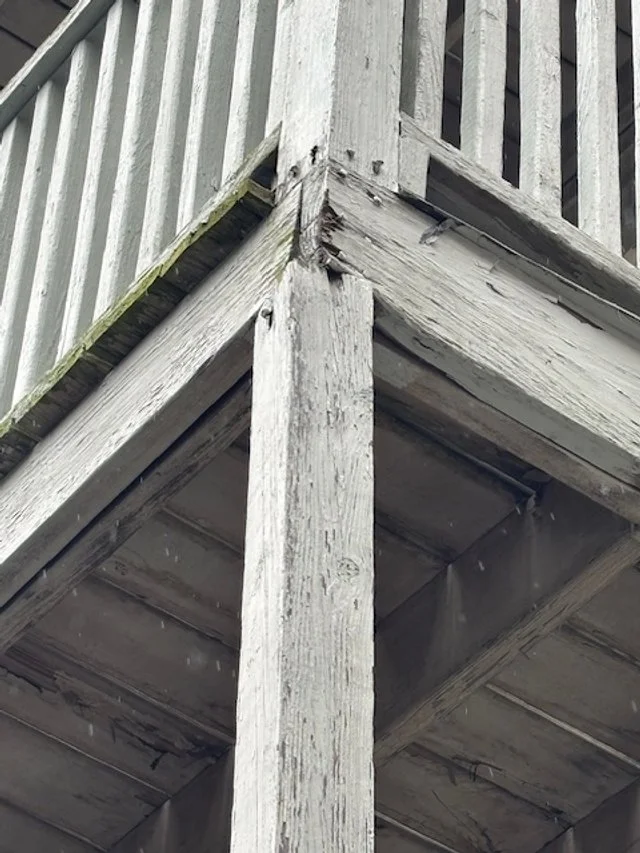 Structural damage on Somerville porch posts and framing
