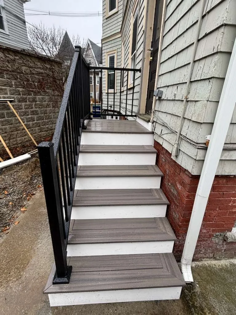 Finished porch stairs and railings built to code