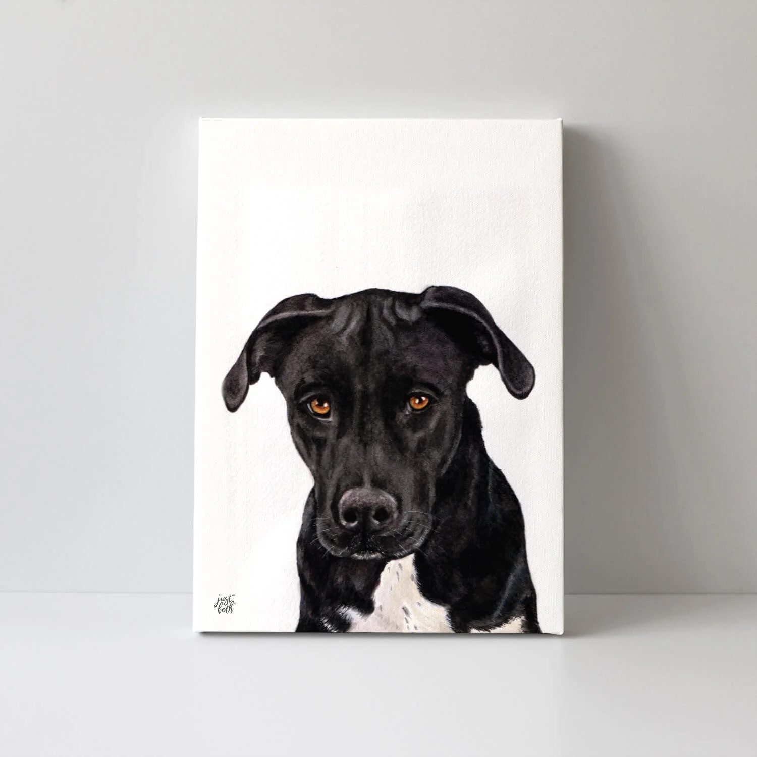 Hand-painted watercolor portrait of a black Labrador by artist Beth Ramirez of Just Beth Designs.