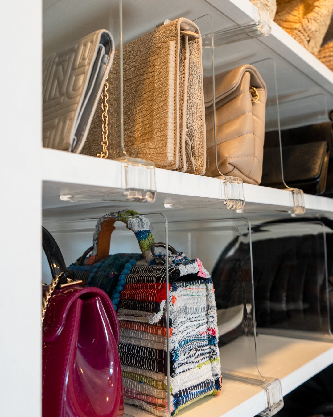 A library of handbags 📚👛 One of my favorite hacks to make choosing a handbag as easy as possible... should we do a tutorial?! 👀