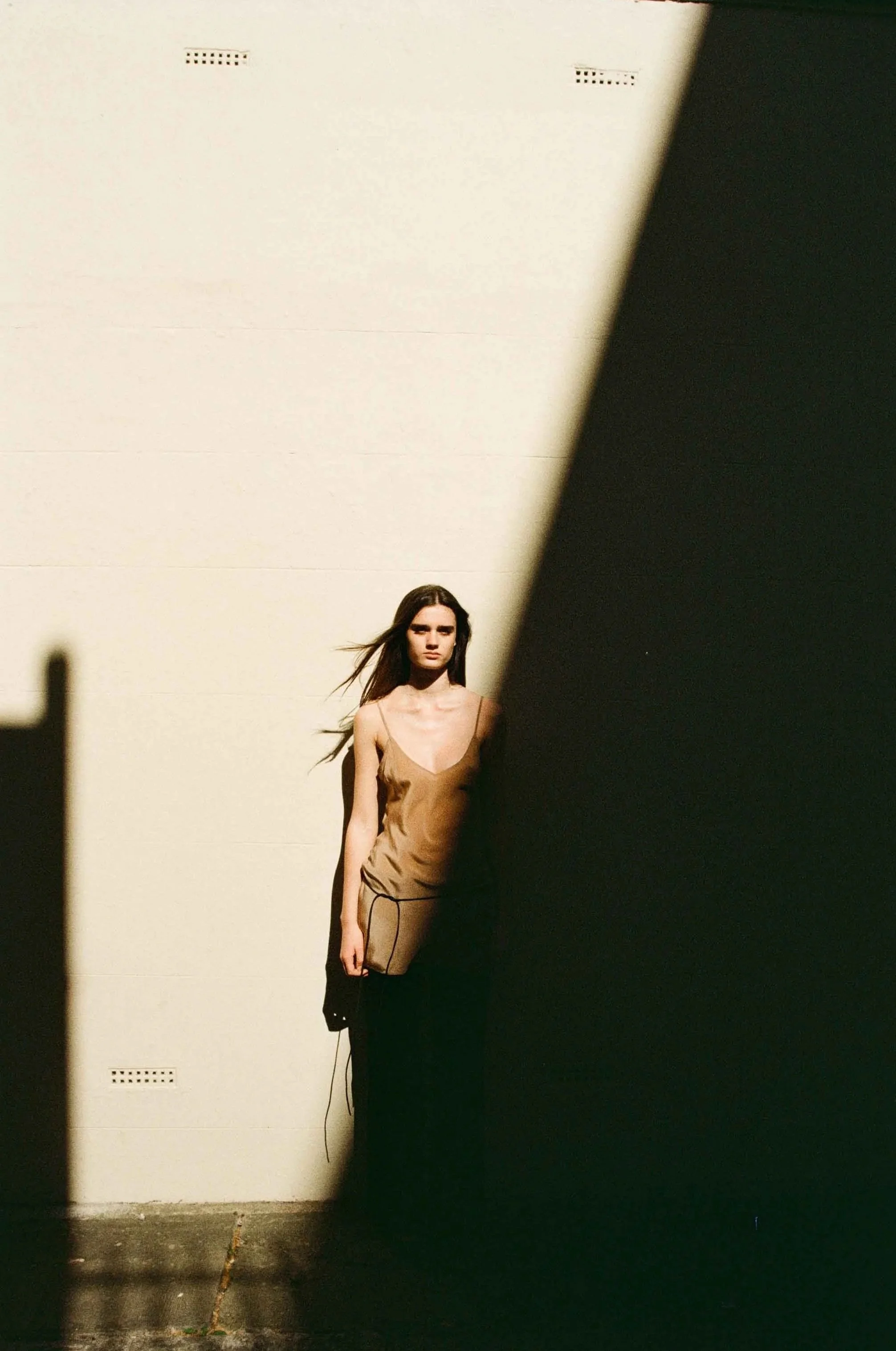 Contemporary fashion photography for editorial publications, featuring considered styling and a natural film aesthetic.