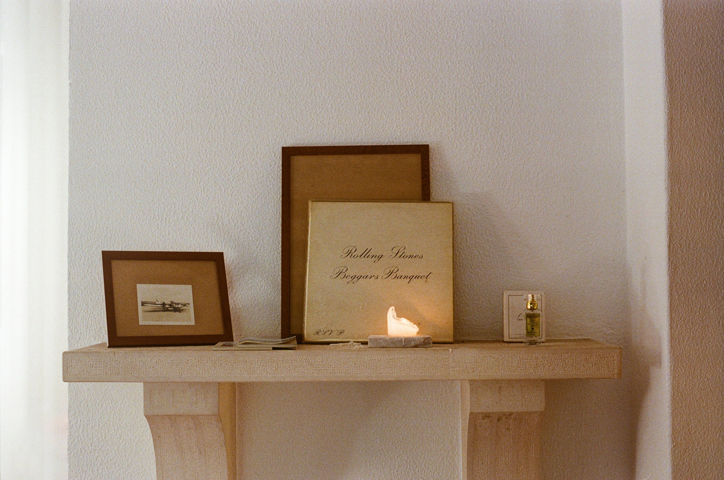 Editorial fashion photography on 35mm film, combining minimal styling with an organic outdoor setting.