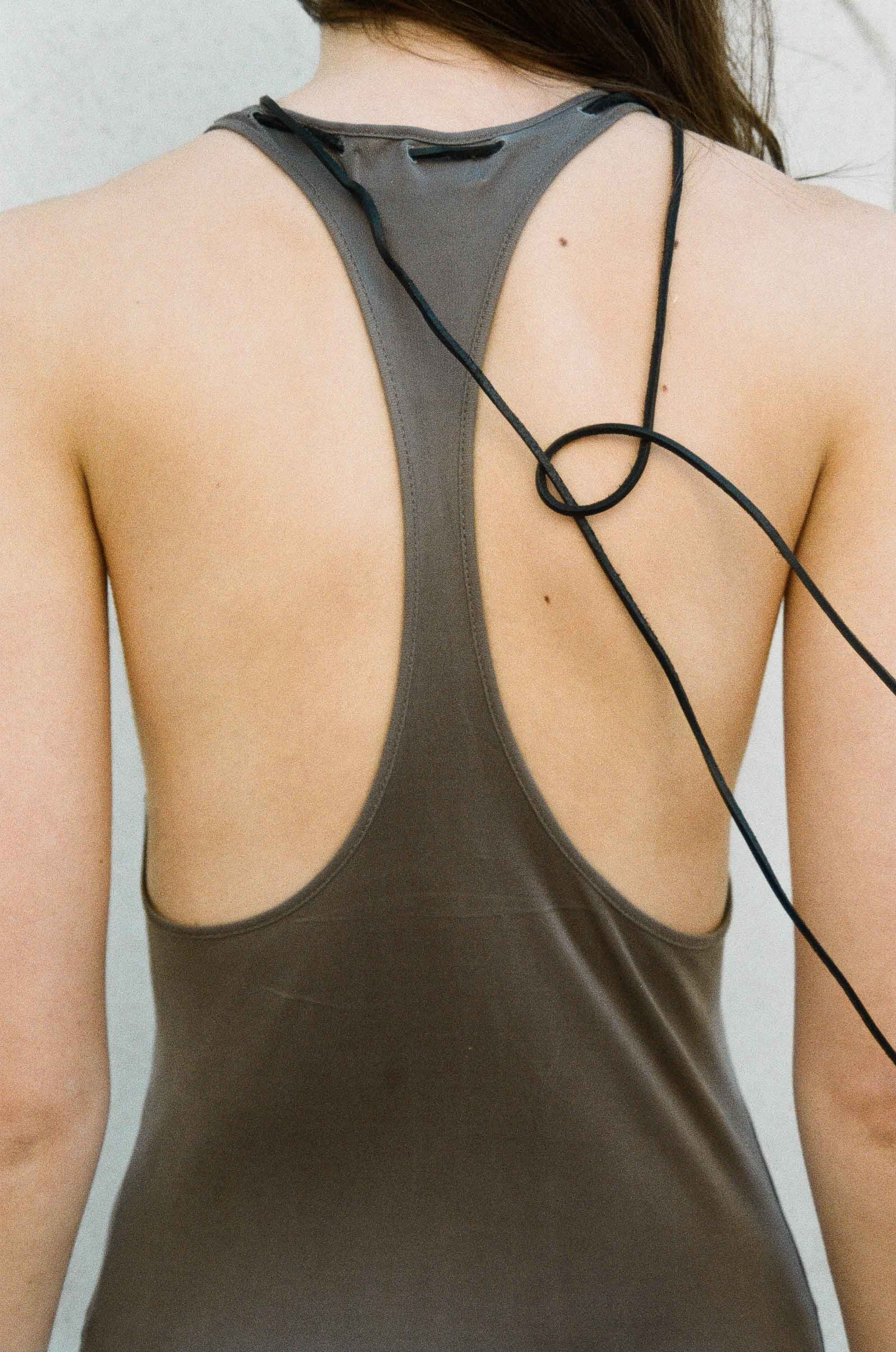 Fashion story photographed on film, combining experimental composition with contemporary editorial styling.