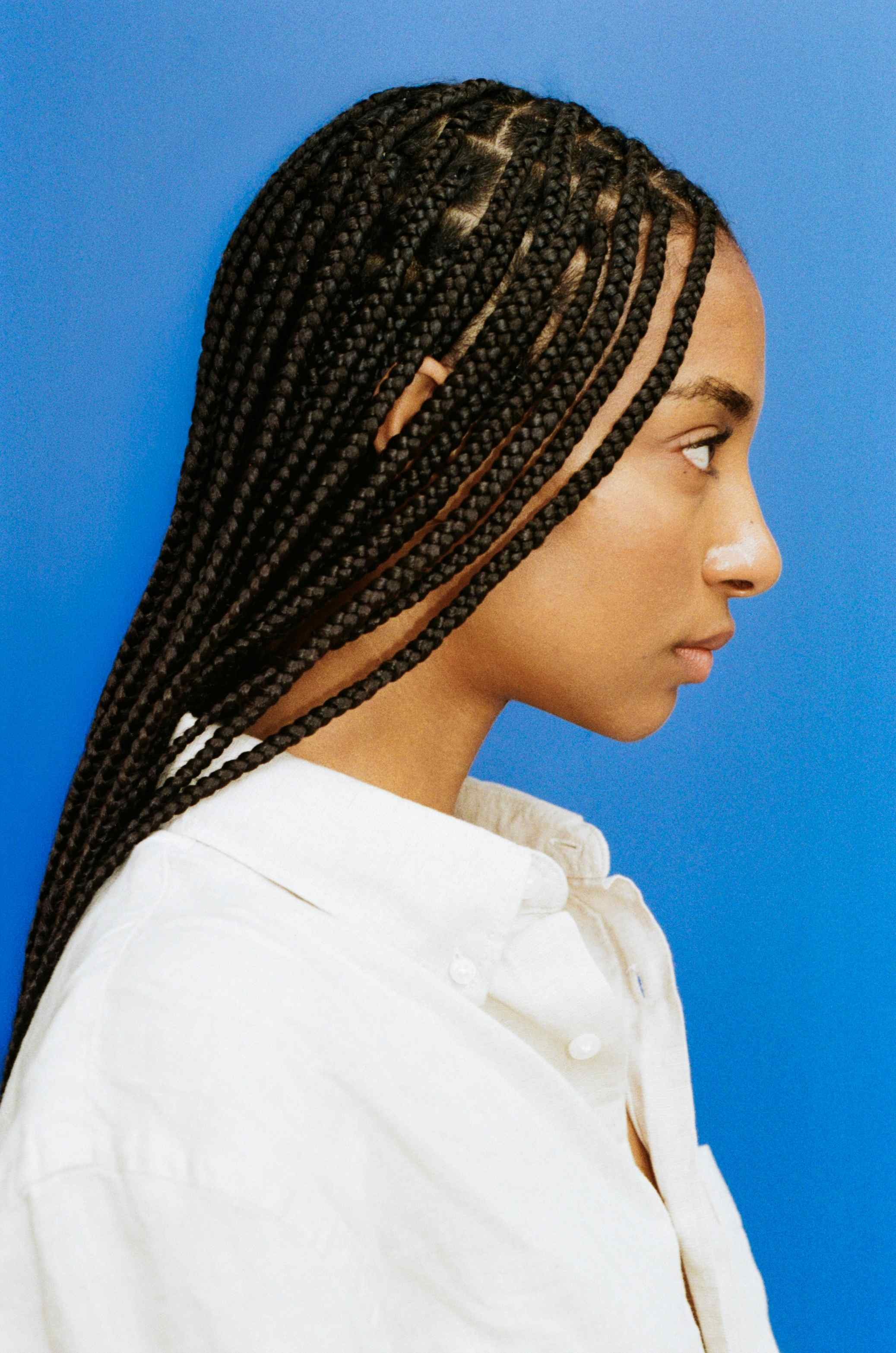 Art-directed fashion portrait photographed on film, exploring proportion, texture and contemporary visual storytelling.