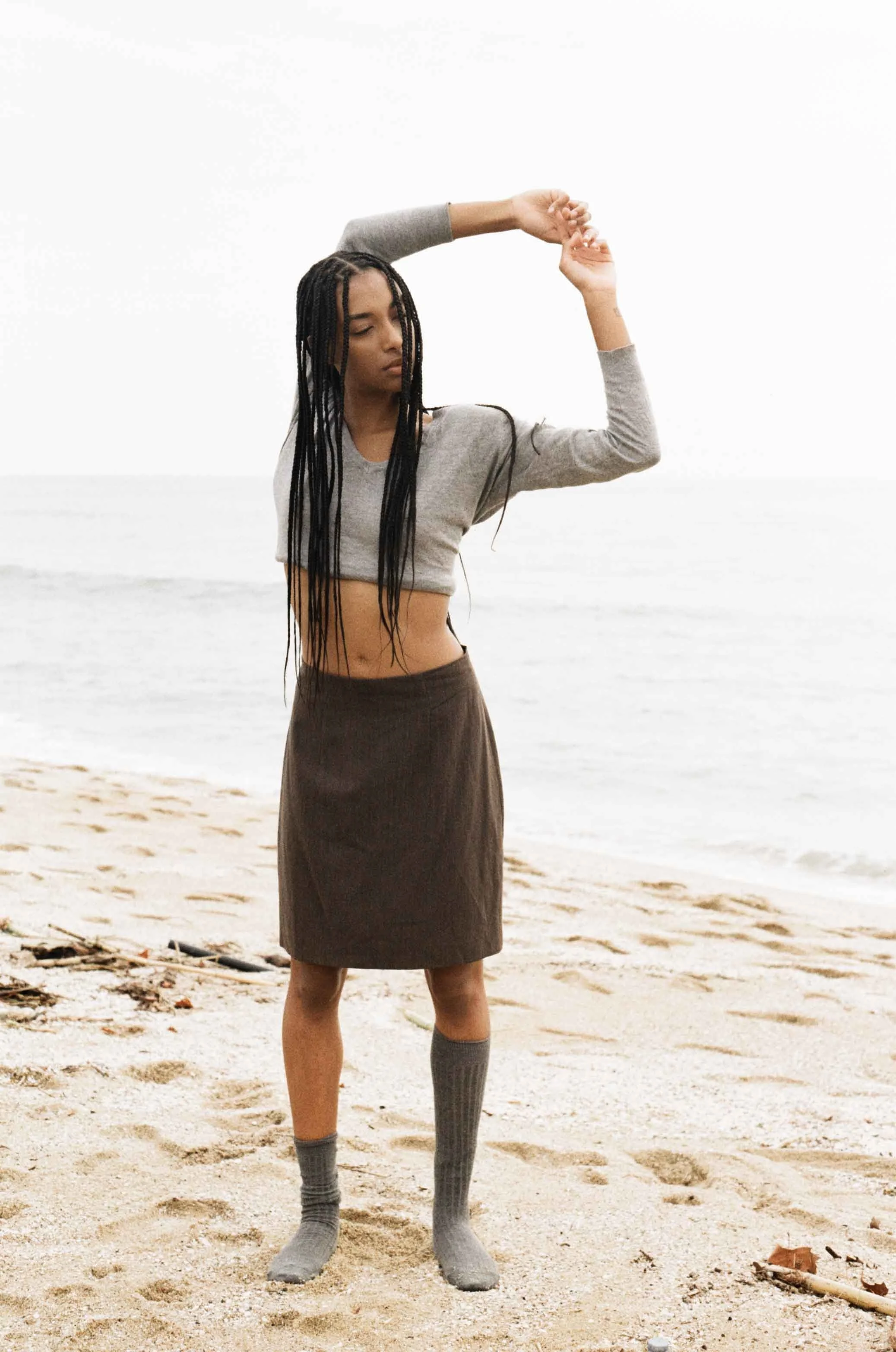 High-fashion editorial imagery captured on analogue film with a focus on form, movement and texture.