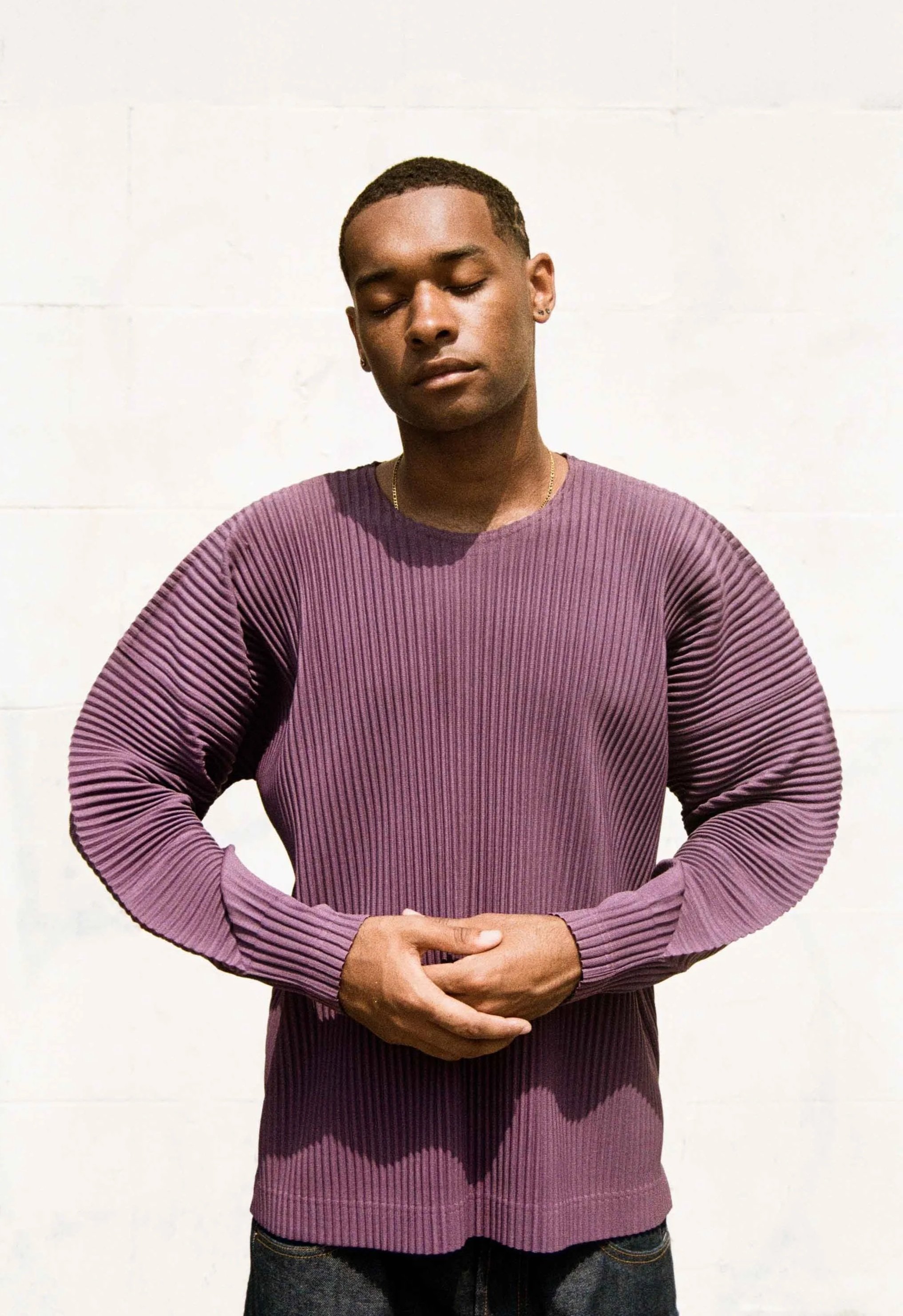 Contemporary fashion editorial featuring minimalist wardrobe styling and tactile analogue photography.