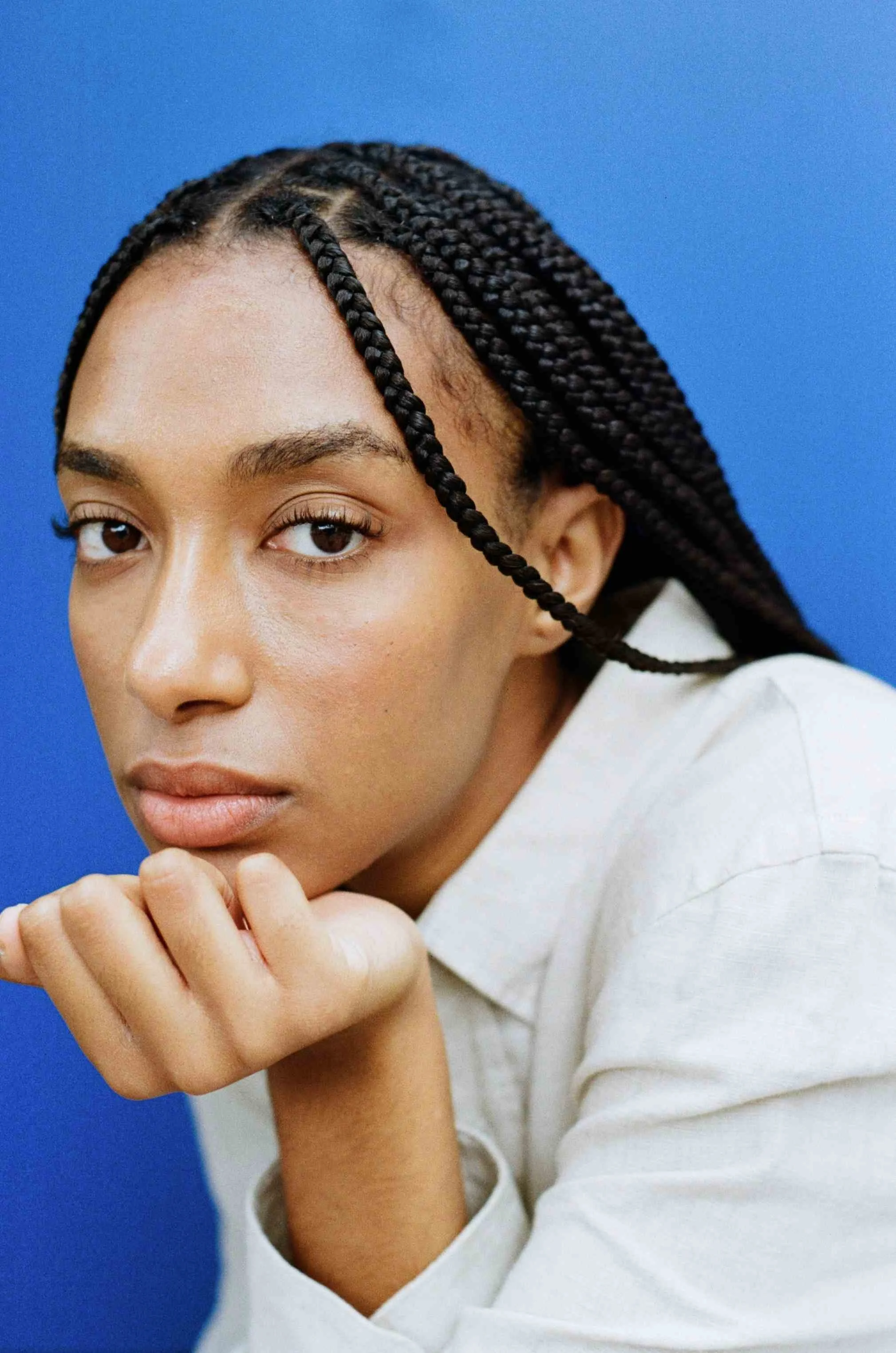 Analogue fashion portraiture blending candid expression, modern silhouettes and understated editorial direction.