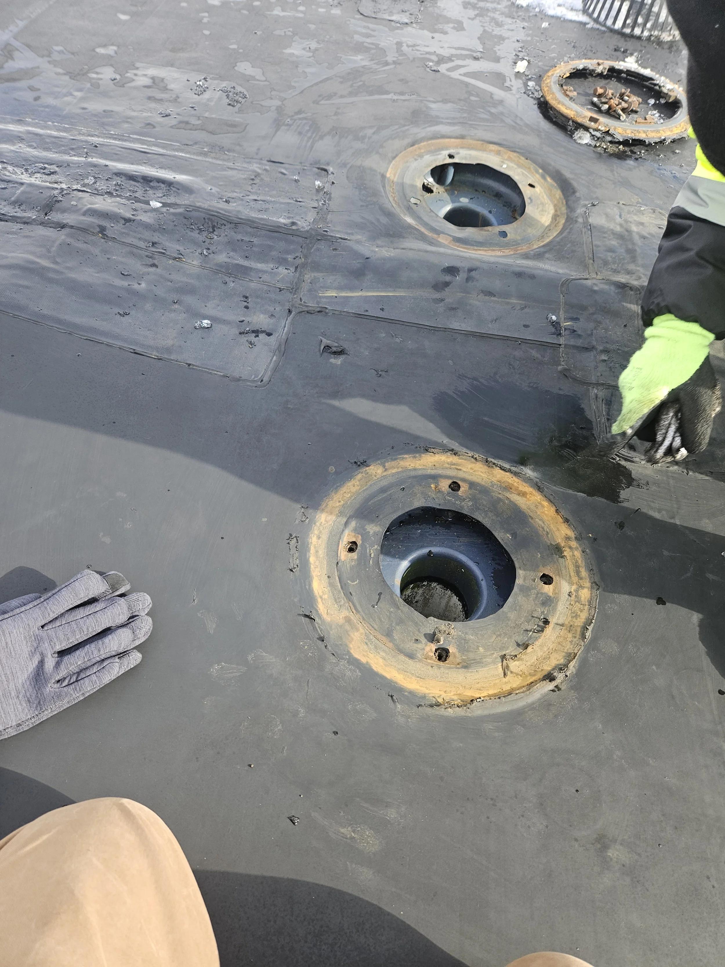 20260204_101232 roof repair at roof drain.jpg