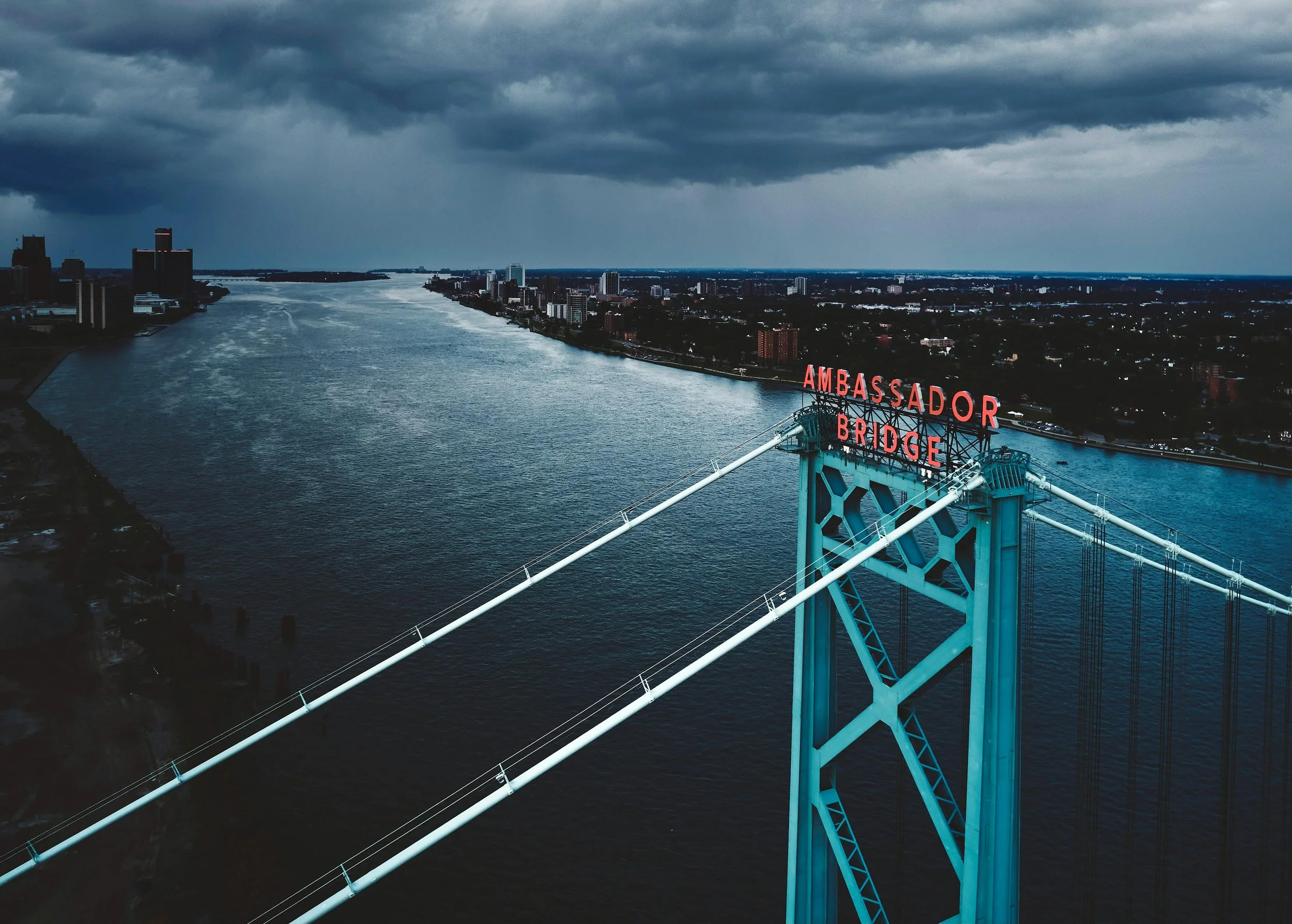 Detroit's Ambassador Bridge over the Detroit River at dusk