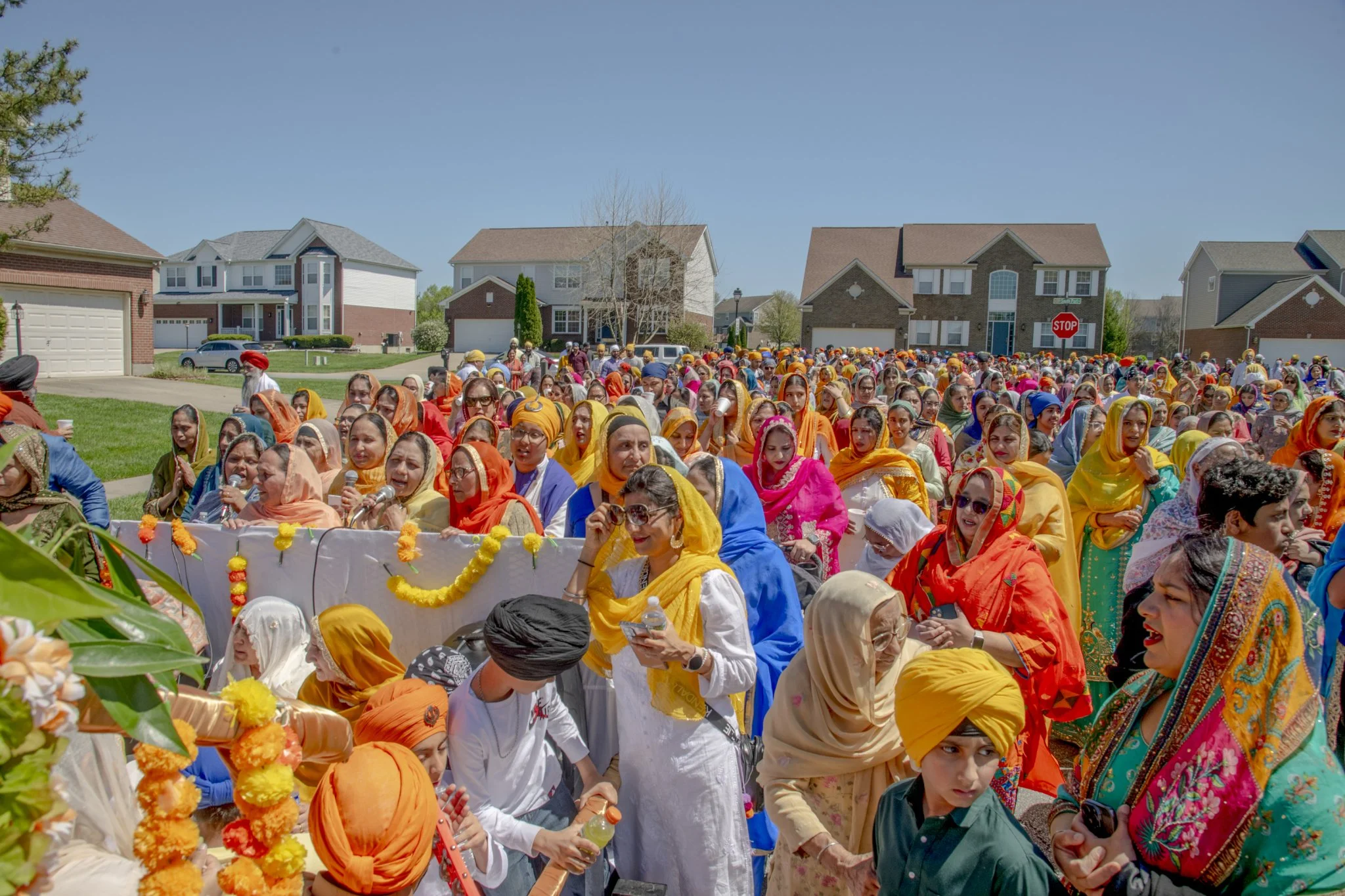 The Sikh community celebrates Vaisakhi, the Sikh New Year, with a Nagar Kirtan, a parade featuring hymns, organized by the Guru Nanak Society of Greater Cincinnati to share their culture with the wider Cincinnati community in Hamilton, Ohio, on April