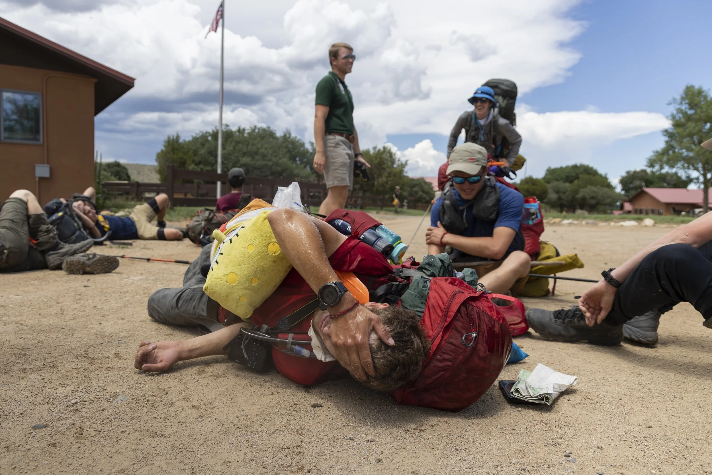 A Rayado member lays as he realizes he finished his 21 day trek at Philmont Scout
Ranch in Cimarron, New Mexico, on July 9, 2022. | Zoë Cranfill
