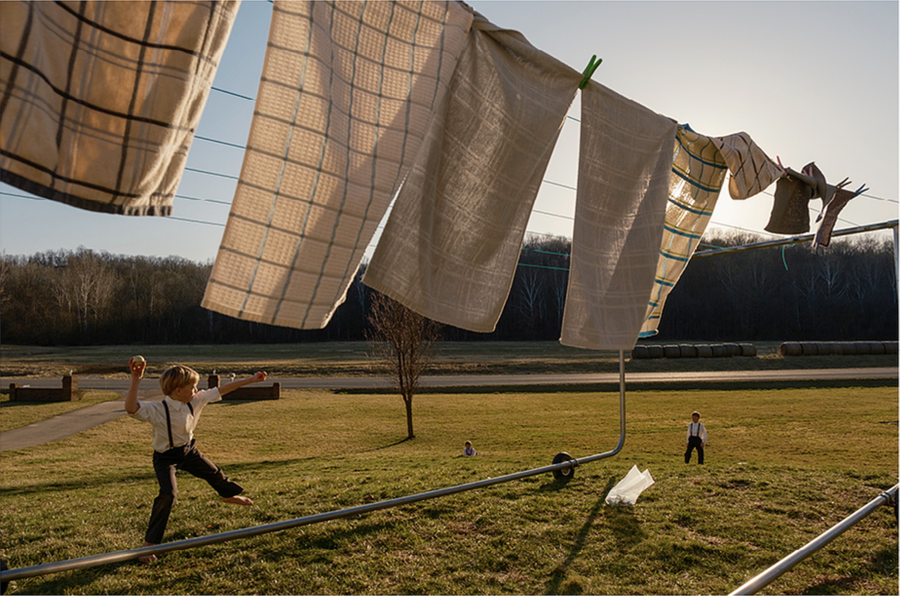 Children from the Amish community outside Amesville, OH, play scatterball before Sunday supper in Joseph Yoder's front yard February 19,2023. | Max Correa