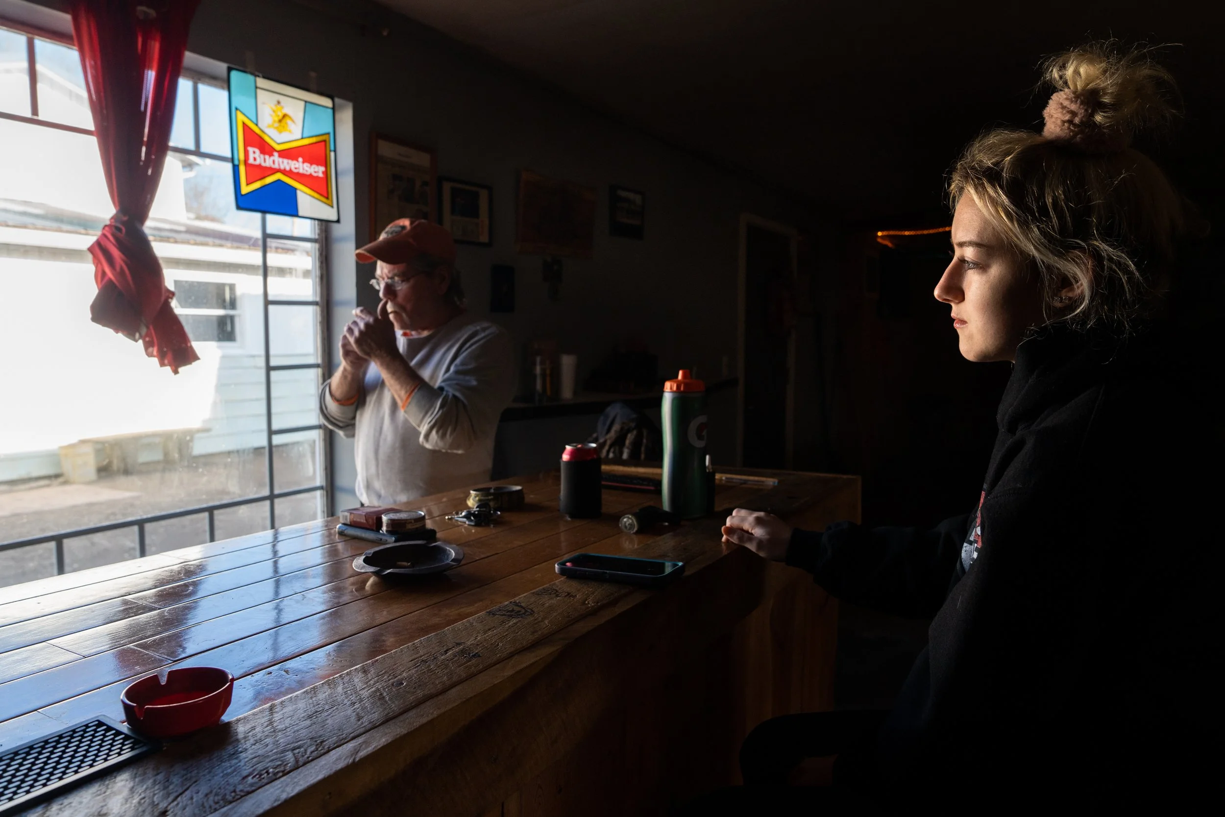 Mckenzie Ollum and her dad. Dwayne, wait a the Peoples Club for Mckenzie's cousin Zack to get dropped off by the school bus. The Peoples Club, a social club of about 30 members from the town and the surrounding area, is one of the few communal spaces