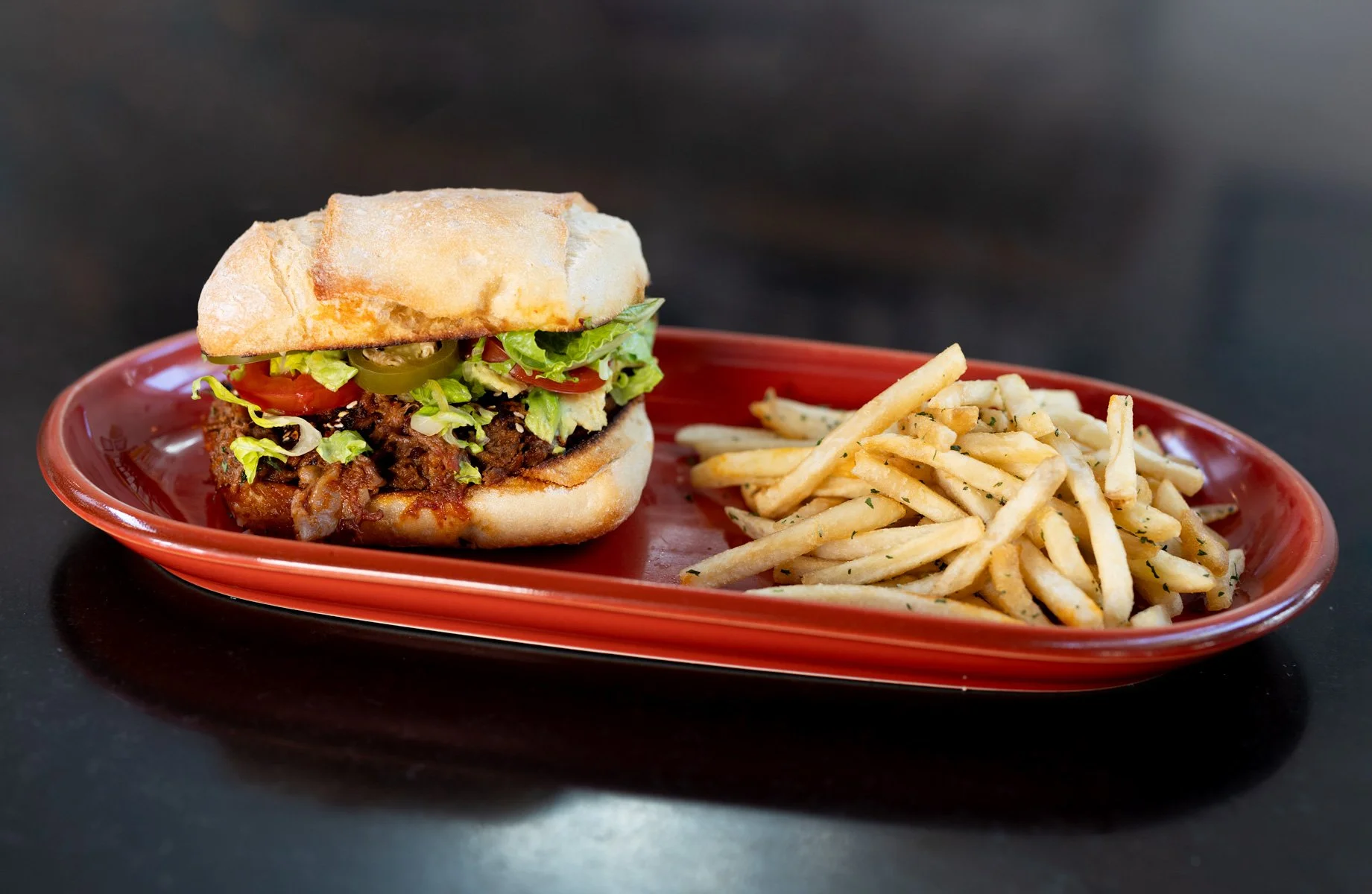 Papito Hayes Chicken torta with french fries,