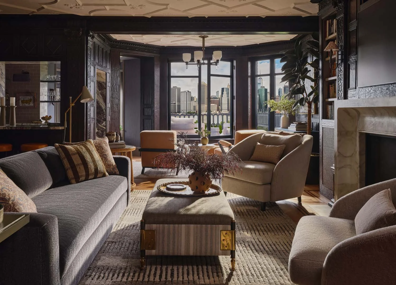 A Historic Brooklyn Townhouse with views of the city. Custom mohair sofa, Calacatta Marble Mantle