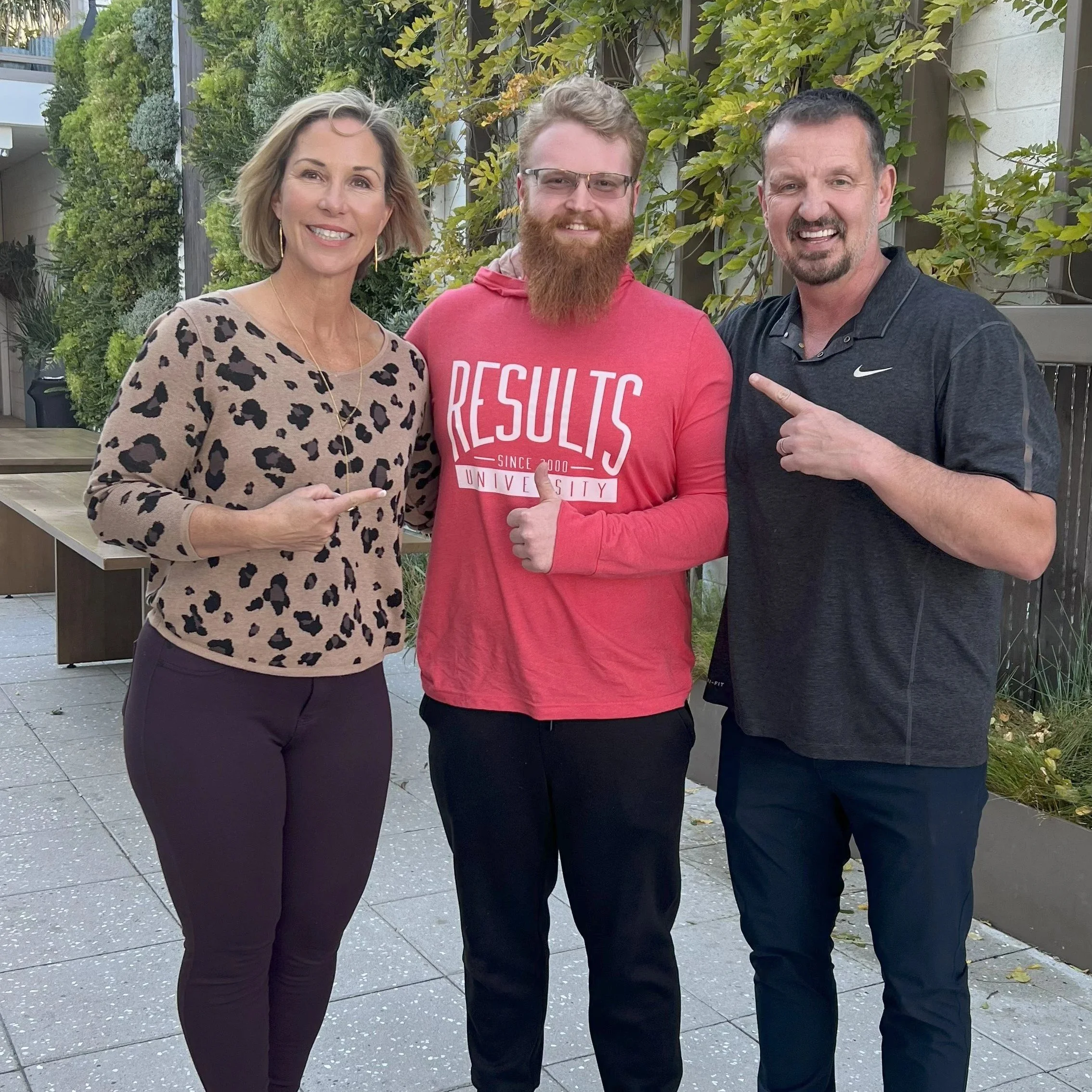 Owner and Head Coach Nathan Rhodes with his coaches, Alwyn and Rachel Cosgrove, at the November 2024 Results Fitness Mastermind event in California. Even coaches have coaches.