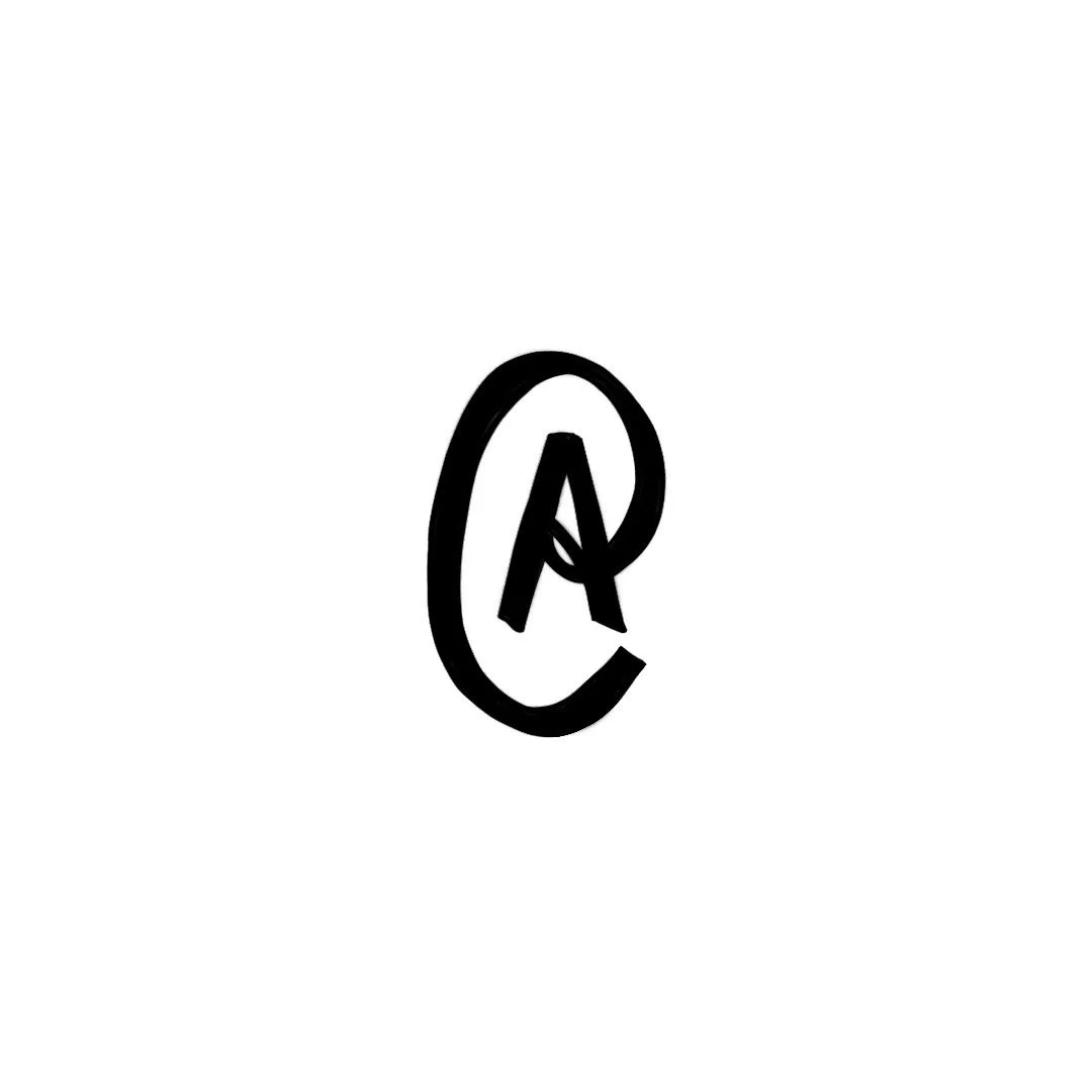 Black handwritten '@' symbol with a stylized letter 'A' inside.